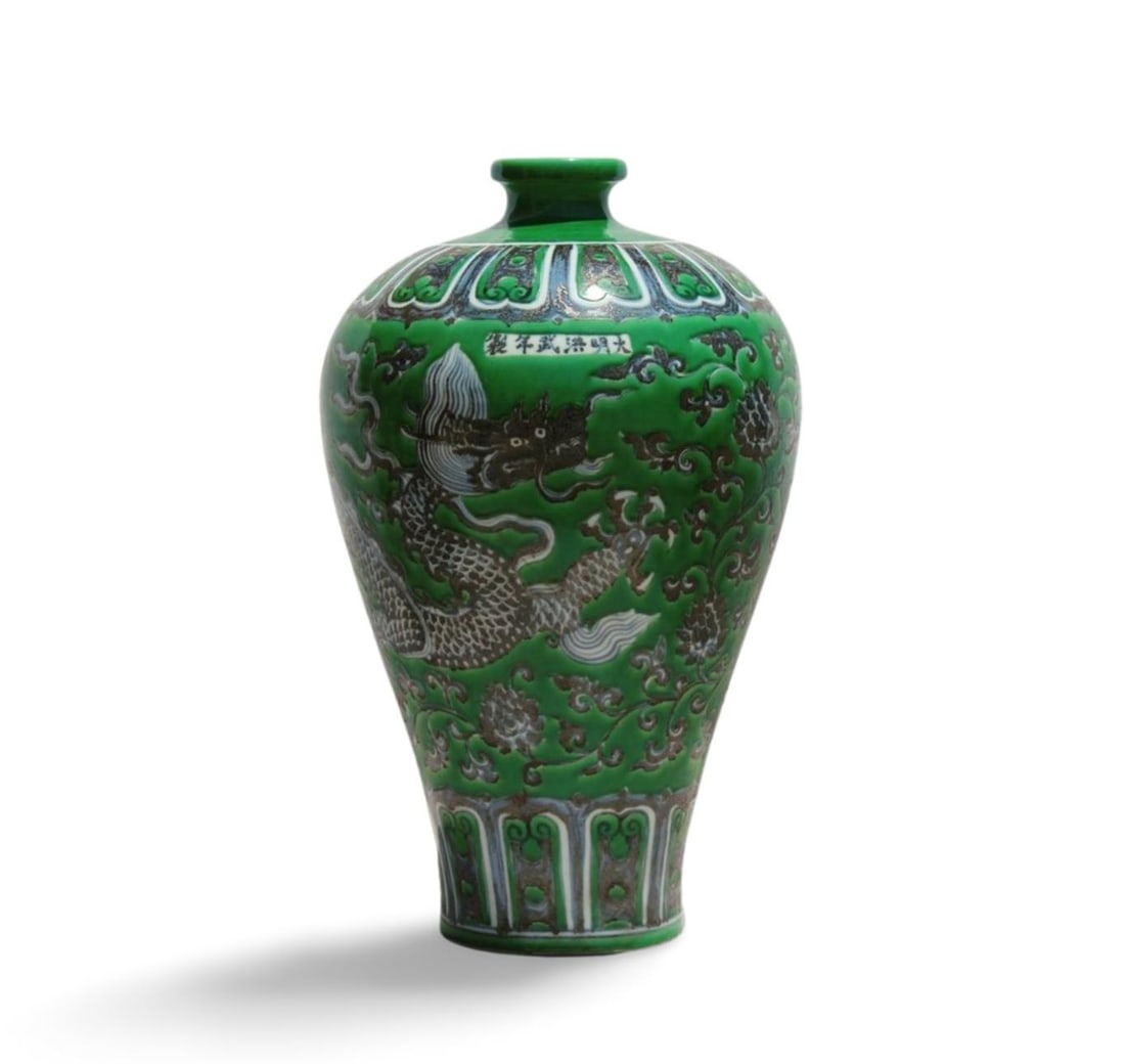 A Green and Black Vase: A Green and Black Vase. Dimension: 17.5" x 10".