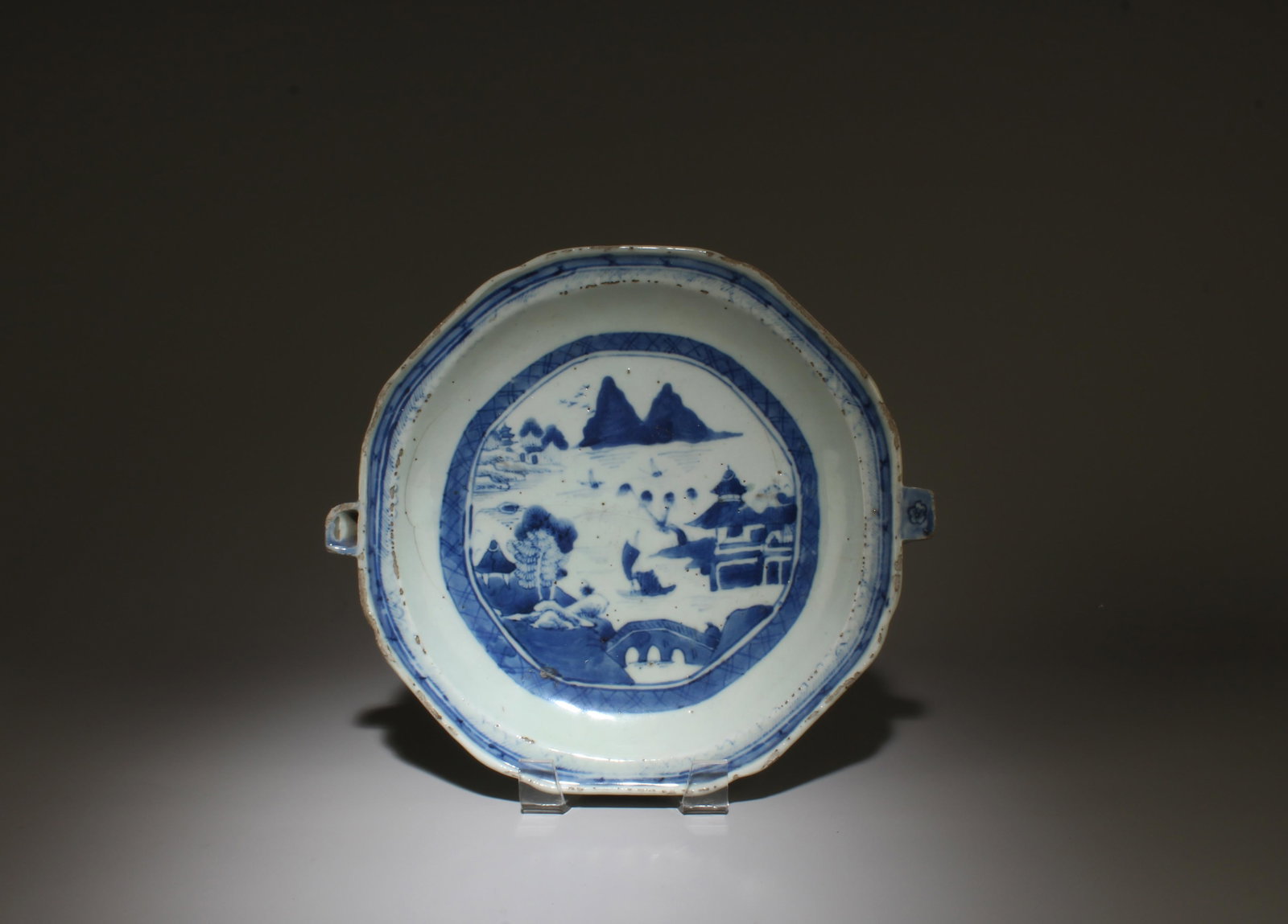 A Blue & White Raised Plate: A Blue & White Raised Plate. Diameter: 10.35"