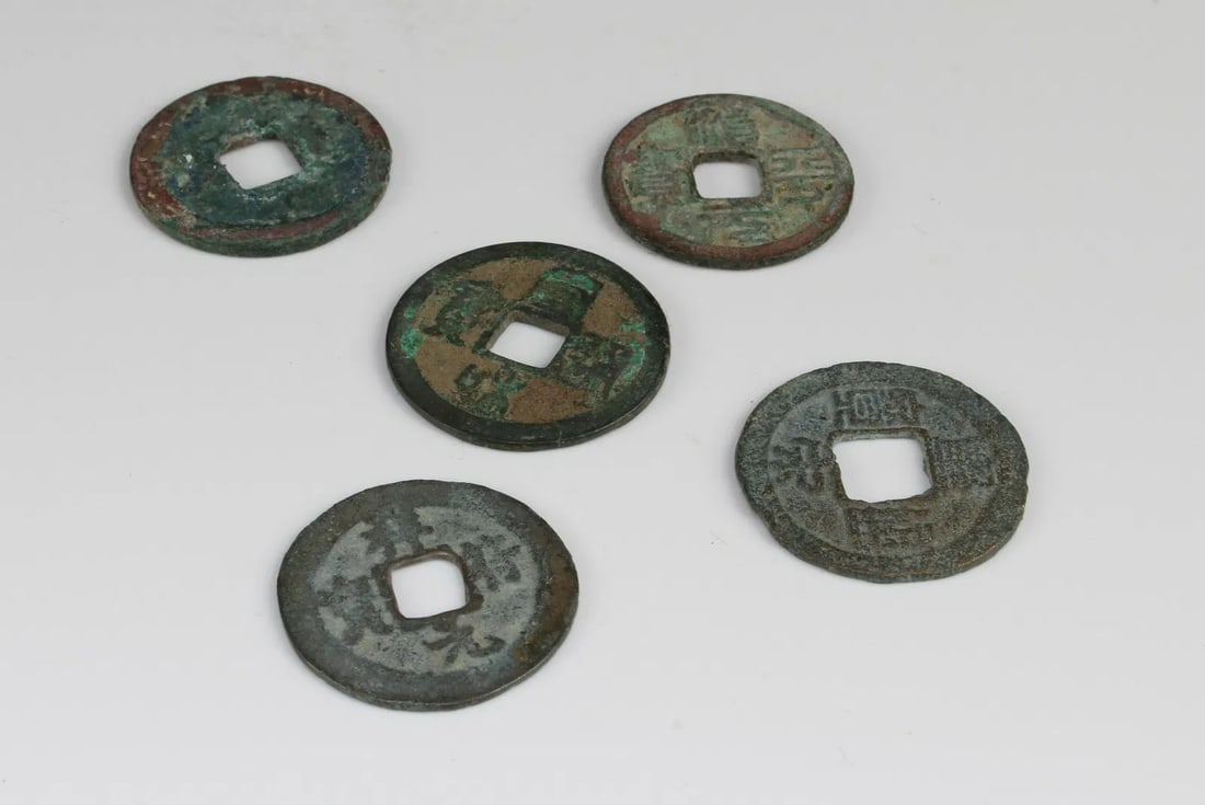 A Group of Five Chinese Coins: A Group of Five Chinese Coins. Diameter: 0.75"