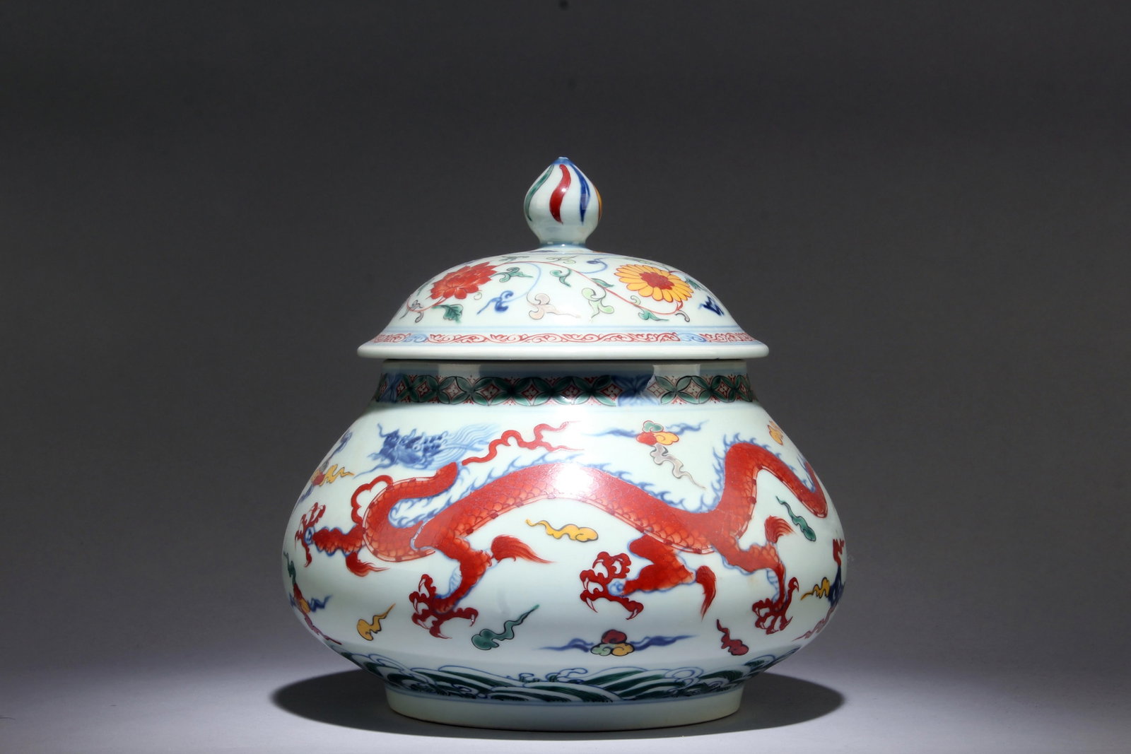 A Doucai Jar with Lid: A Doucai Jar with Lid. Dimensions: 9.5" x 8.75".