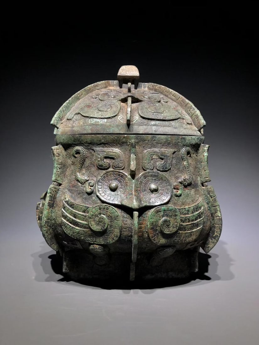A Bronze Yi with Partridge Pattern: A Bronze Yi with Partridge Pattern. Dimensions: 11.81in x 11.81in x 12.20in; Weight: 44.09lbs.