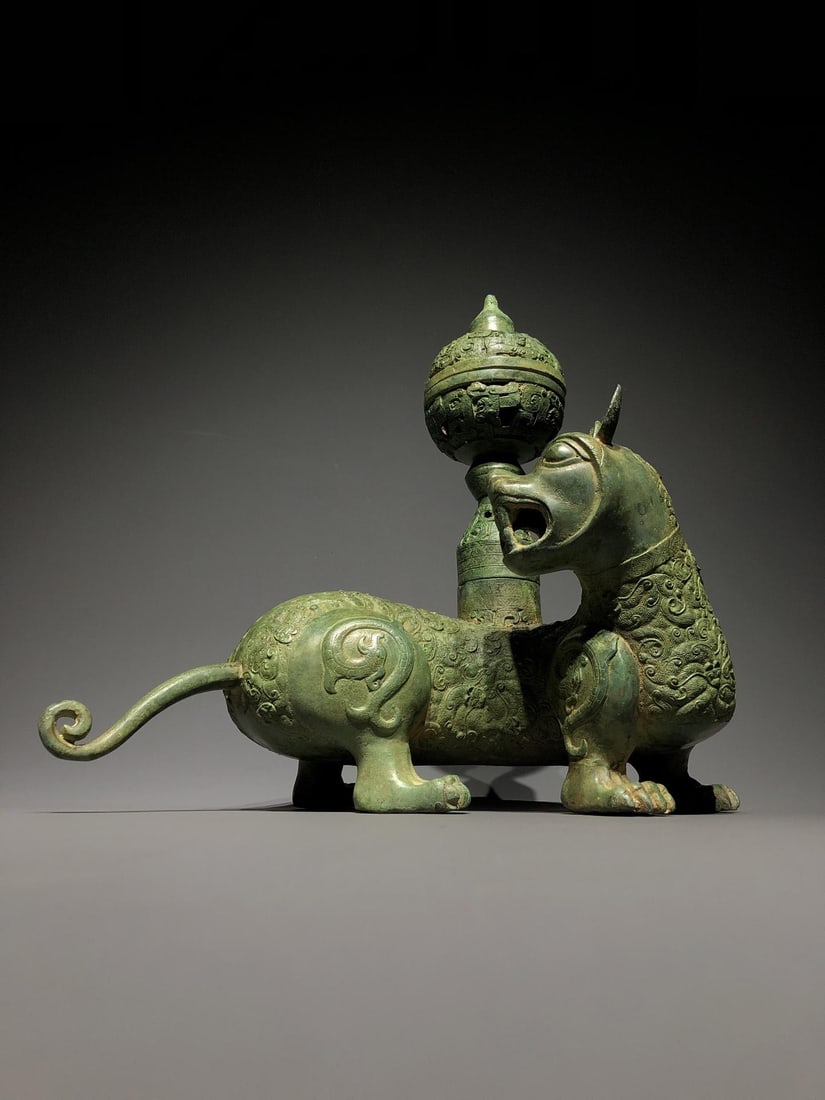 A Bronze Tiger Ornament: A Bronze Tiger Ornament. Dimensions: 14.17in x 6.69in x 8.27in; Weight: 19.84lbs.