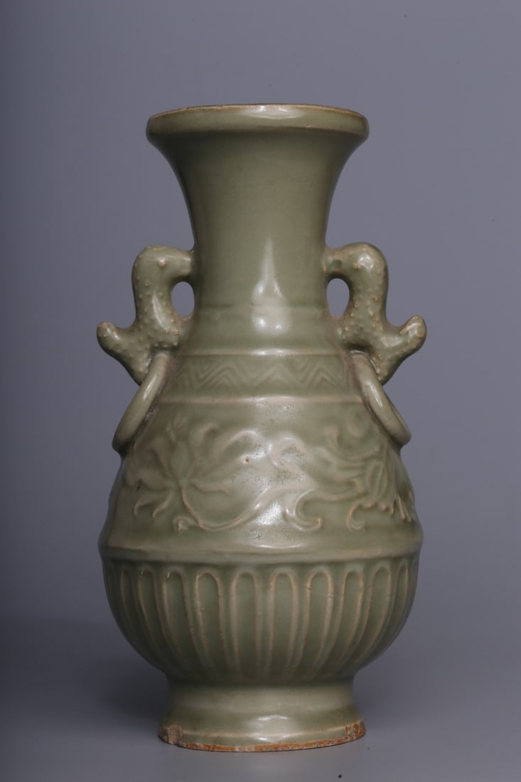 A Hetian White Jade Ring: A Hetian White Jade Ring. Height: 7.28in; Diameter: 3.94in; Weight: 0.99lbs.
