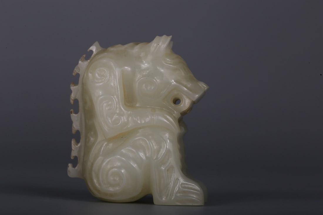 A Hetian White Jade Bear Ornament: A Hetian White Jade Bear Ornament. Dimensions: 1.89in x 1.57in x 1.18in; Weight: 0.19lbs.