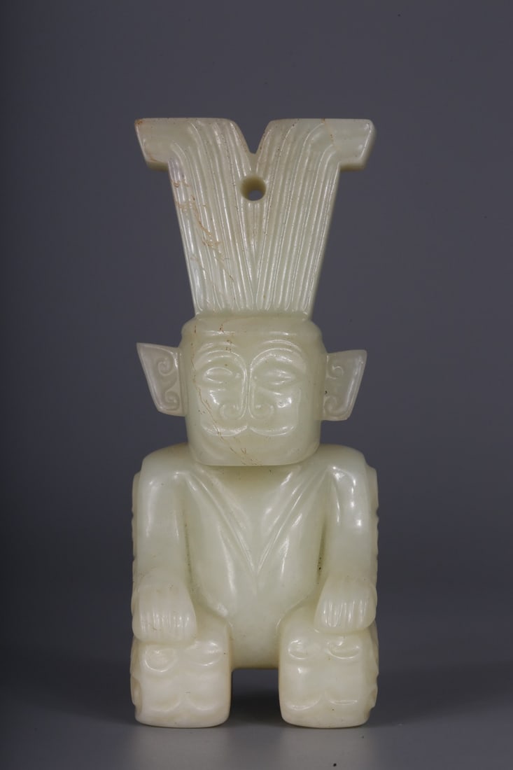 A Hetian White Jade Ornament: A Hetian White Jade Ornament. Dimensions: 4.17in x 1.77in x 1.42in; Weight: 0.41lbs.