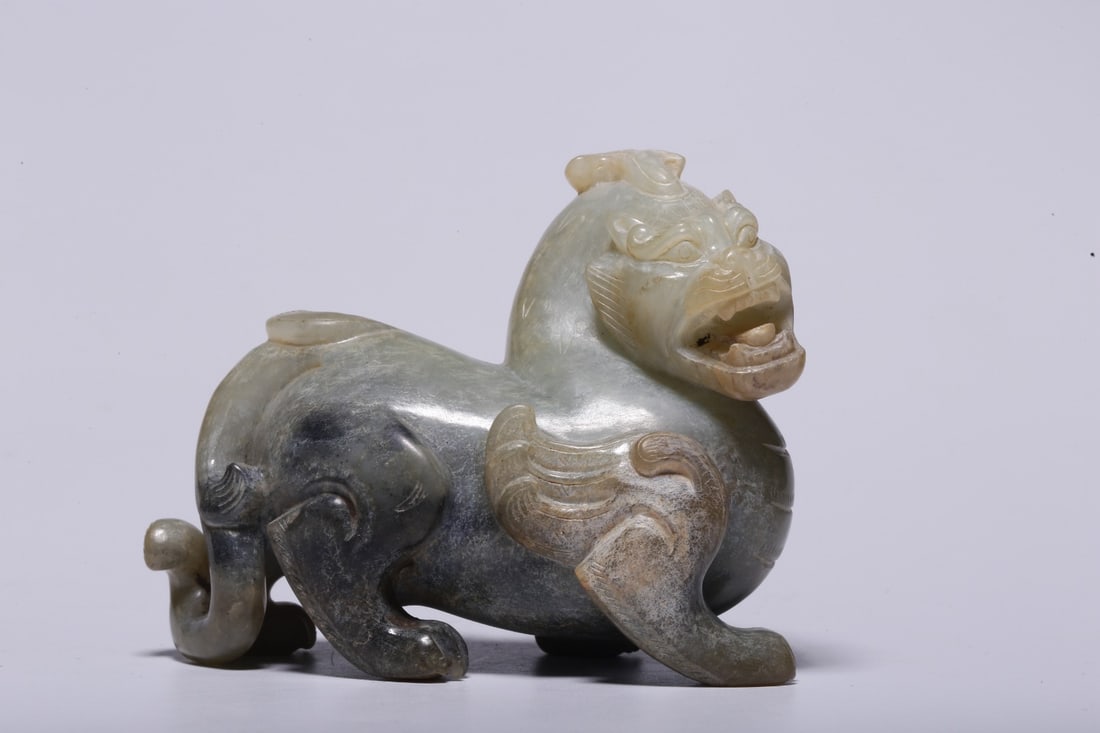 A Jade Tianlu Ornament: A Jade Tianlu Ornament. Dimensions: 2.95in x 3.78in x 2.17in; Weight: 0.73lbs.