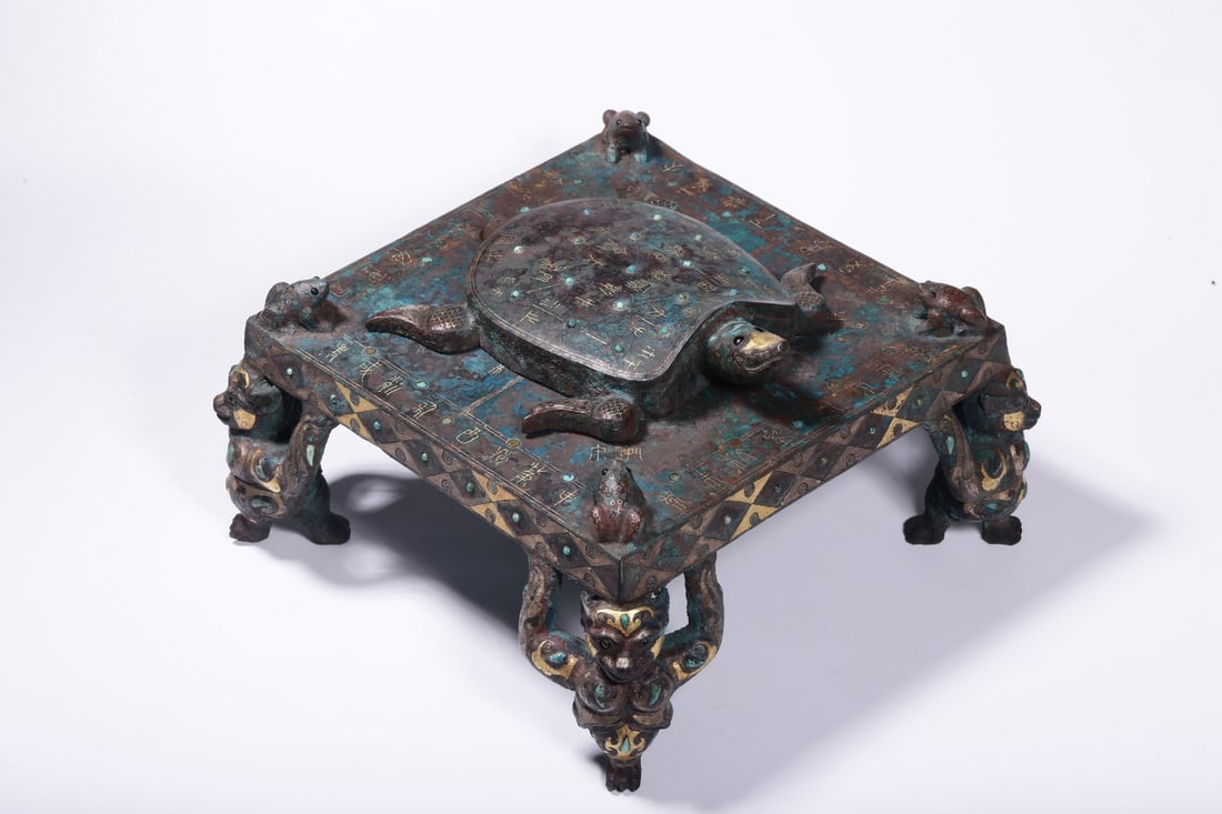 A Bronze Inlaid Gold and Silver Turquoise-Inlaid Square Vessel: A Bronze Inlaid Gold and Silver Turquoise-Inlaid Square Vessel. Dimensions: 5.31in x 8.66in x 8.66in; Weight: 4.82lbs.