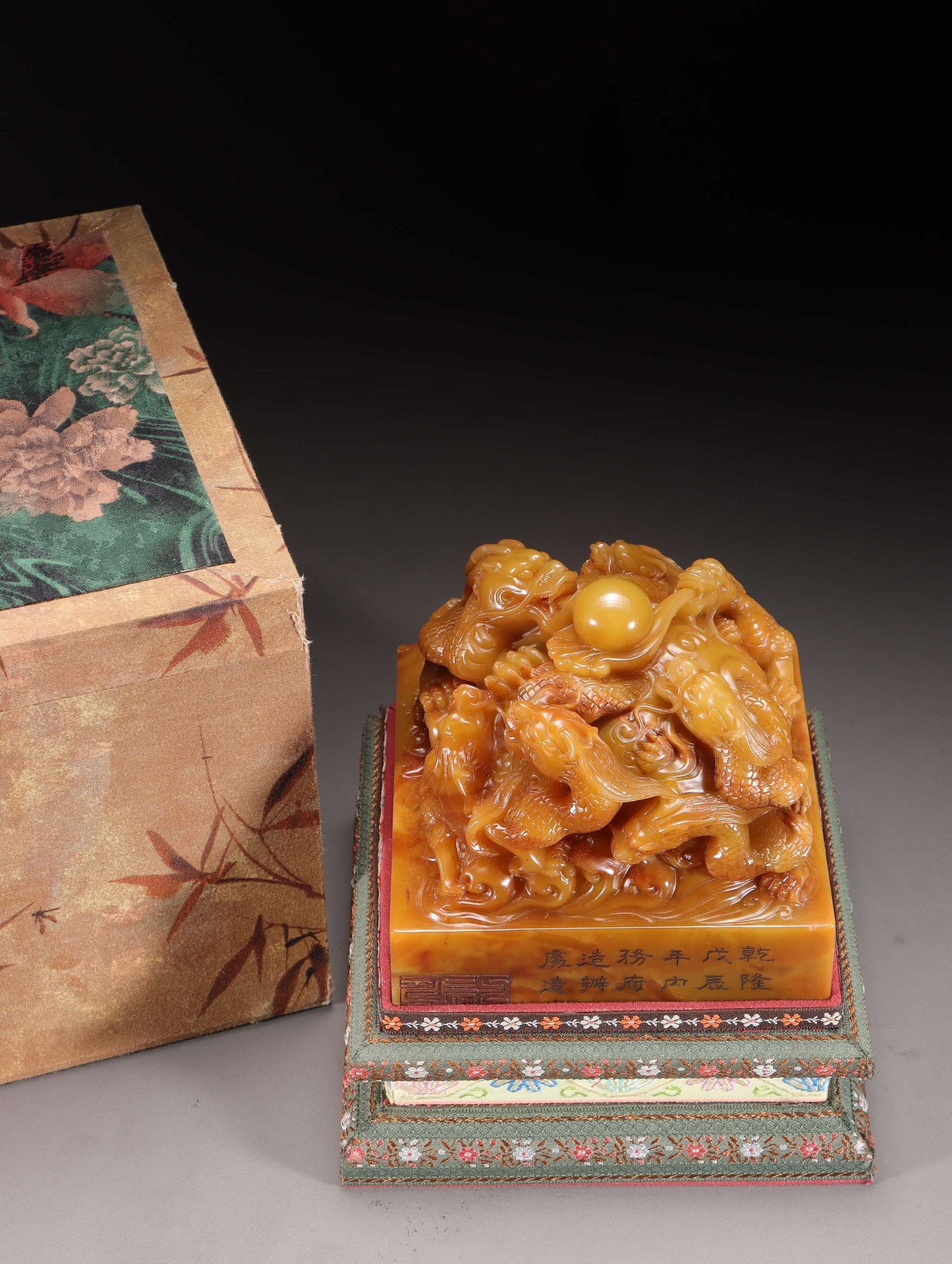 A Shoushan Tianhuang Nine-Dragon Seal: A Shoushan Tianhuang Nine-Dragon Seal. Dimensions: 4.33in x 4.80in x 4.80in; Weight: 5.55lbs.