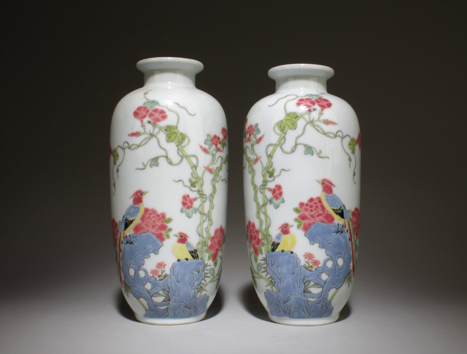 A Pair of Porcelain Vases with Bird and Flower: A Pair of Porcelain Vases with Bird and Flower Design Pattern. Dimensions: 4" x 8.2".