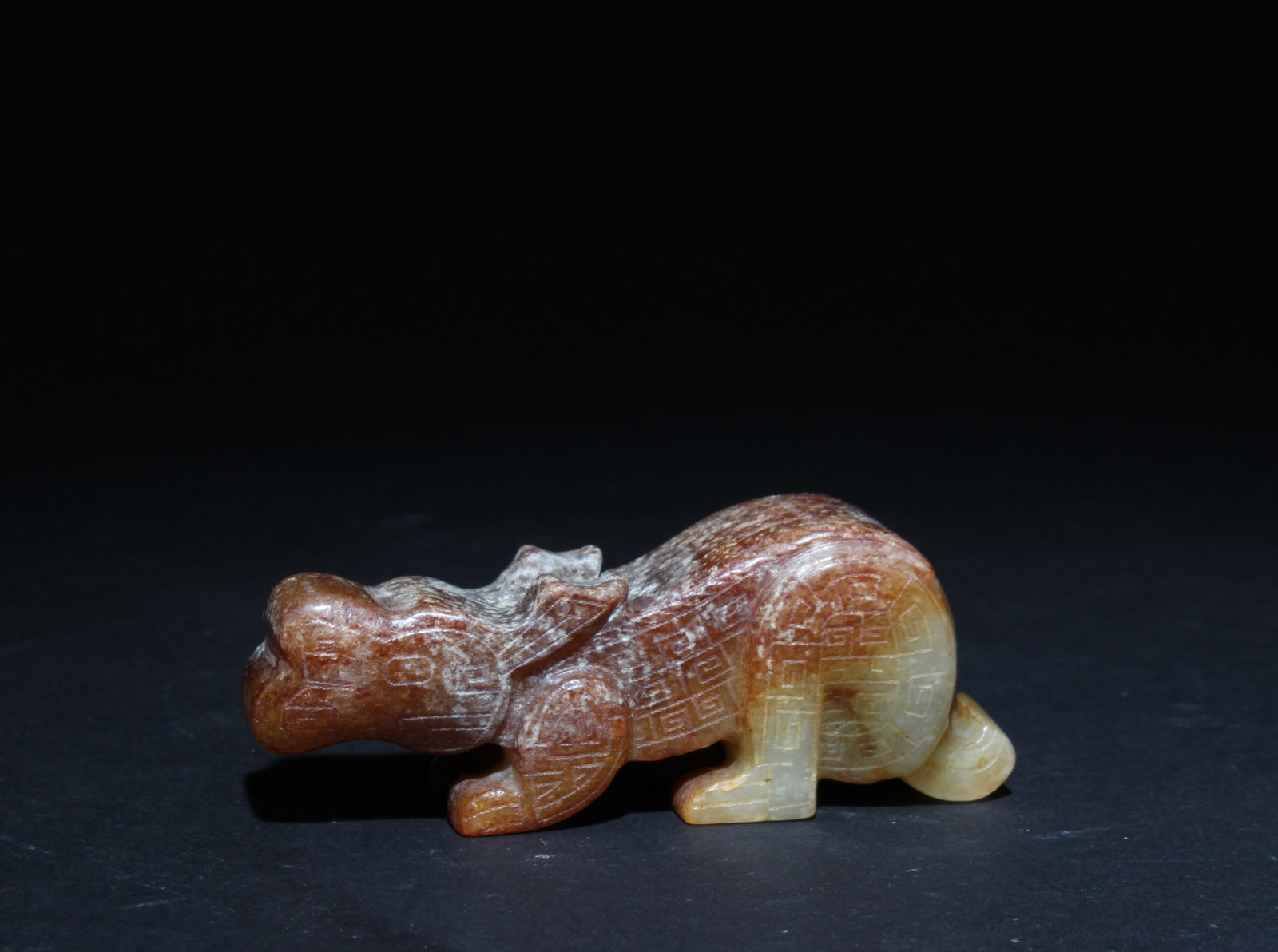 A Jade Ornament: A Jade Ornament. Dimensions: 2.75" x 0.75" x 1".