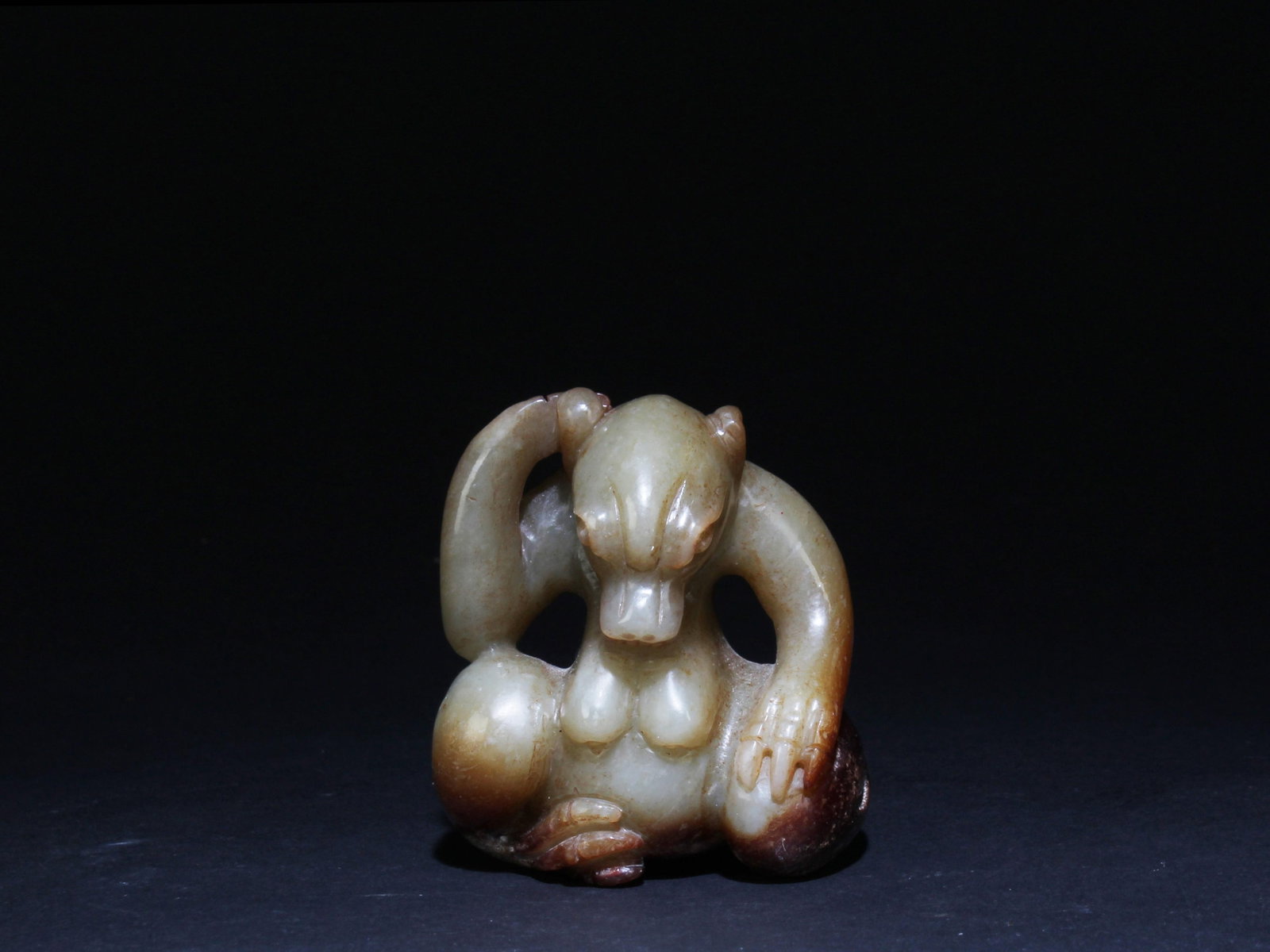 A Jade Ornament: A Jade Ornament. Dimensions: 2.1" x 2".