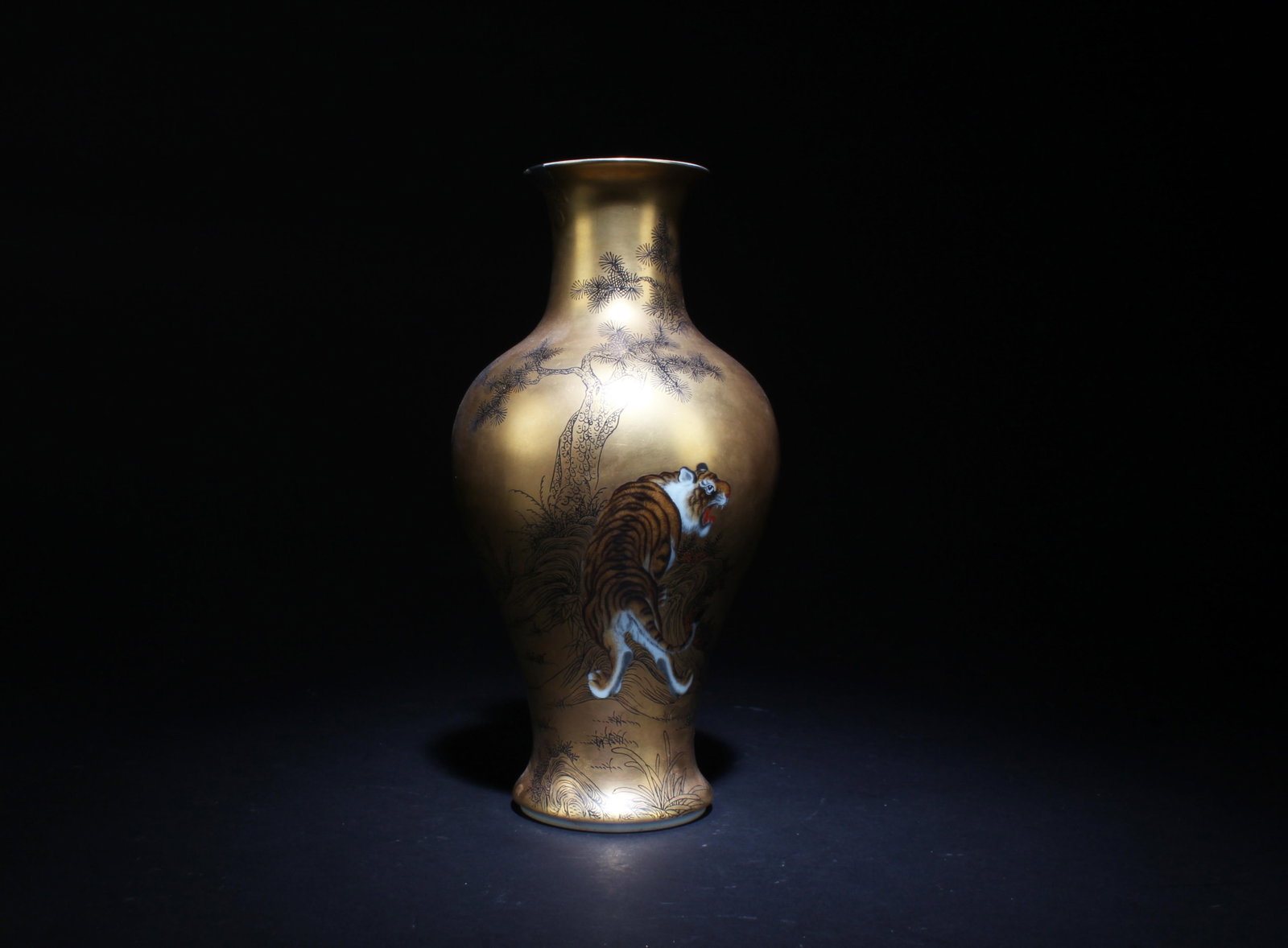 A Porcelain Vase with Tiger Motif: A Porcelain Vase with Tiger Motif. Dimensions: 9.2" x 4.5".