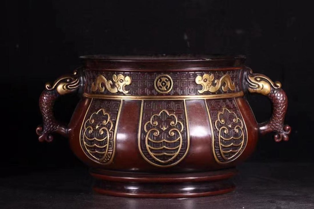 A Gilt Bronze Incense Burner: A Gilt Bronze Incense Burner. A six character mark is imprinted at the base. Height: 4.75" Length: 9.75" Weight: 8.04lb