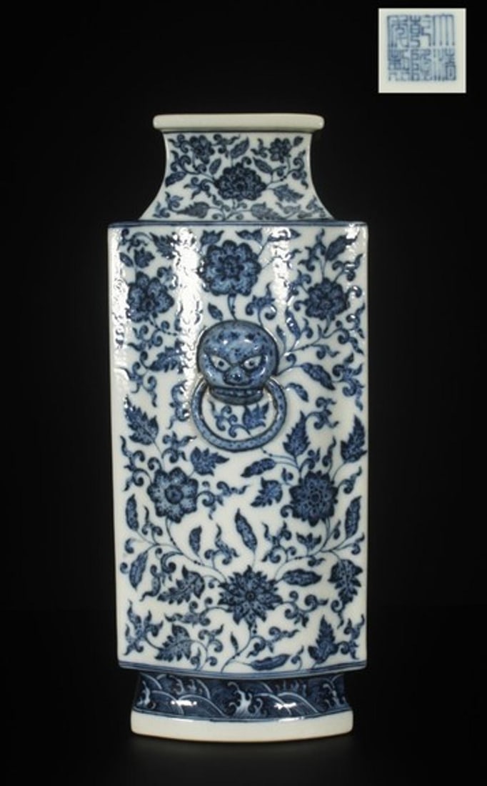A Blue & White Vase: A Blue & White Vase, "QianLong" mark at base,Dimensions: 13.4in x 6.3in.