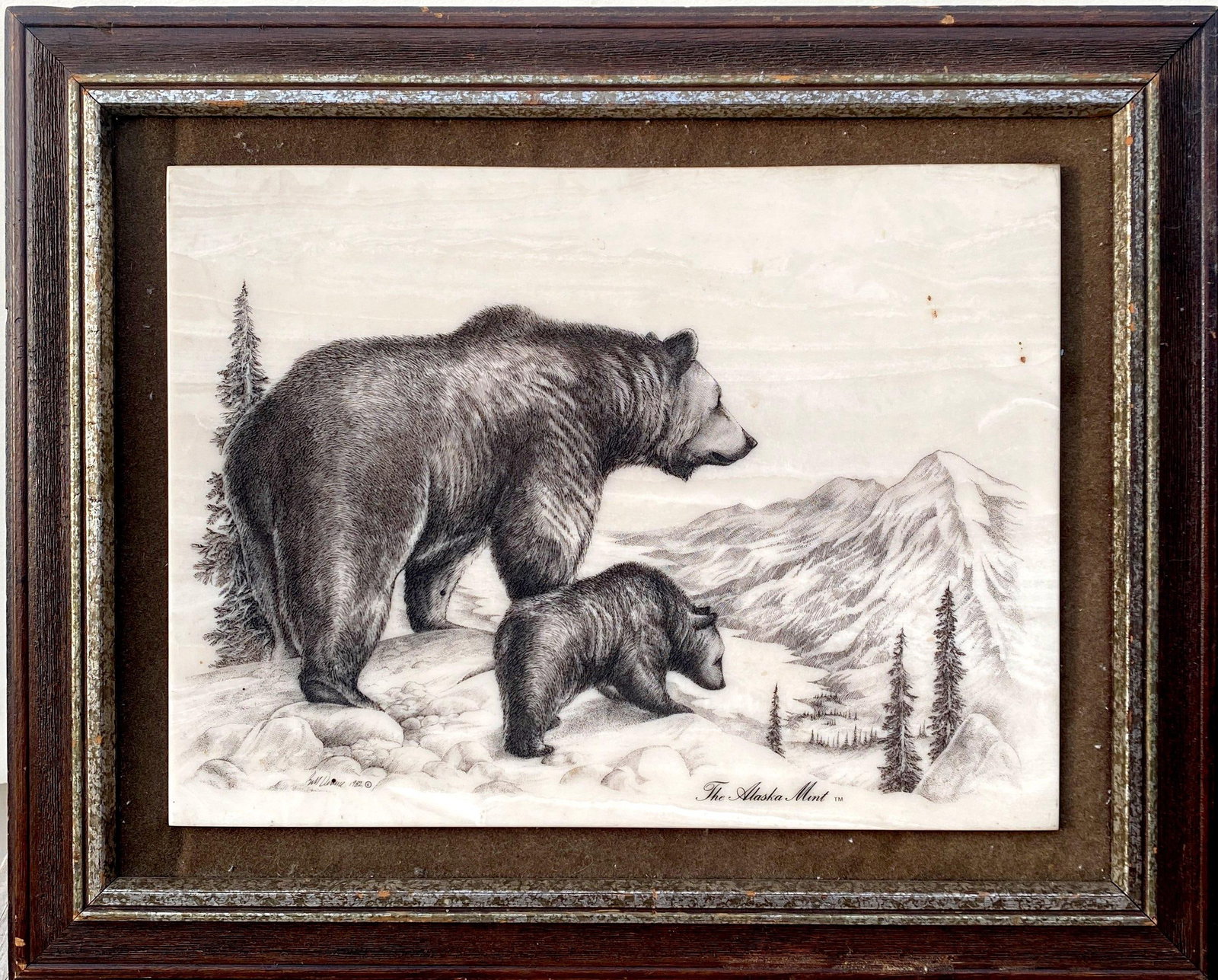 A Framed Cultured Marble Painting: A Framed Cultured Marble Painting, depicting two bears.Signature of artist Bill Devine can be foud at the back of the frame. Length: 16.5" Height: 13.5" (Frame)