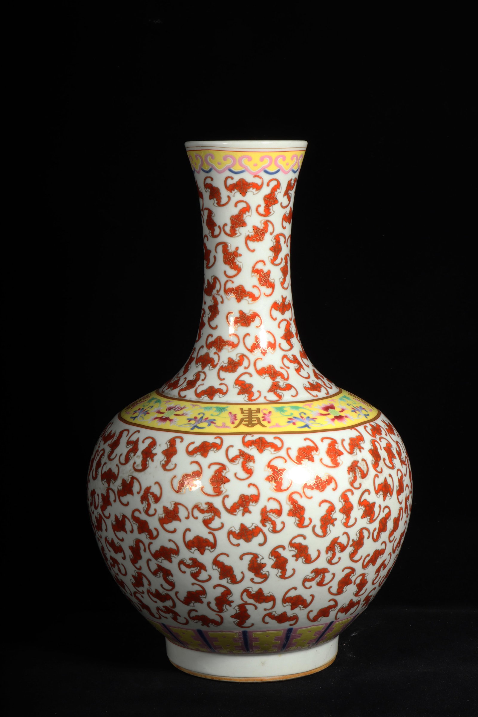 A Chinese 100 Bat Pattern Vase: A Chinese 100 Bat Pattern Vase. "GuangXi" mark at base. Dimensions: 12.6in x 7.9in.