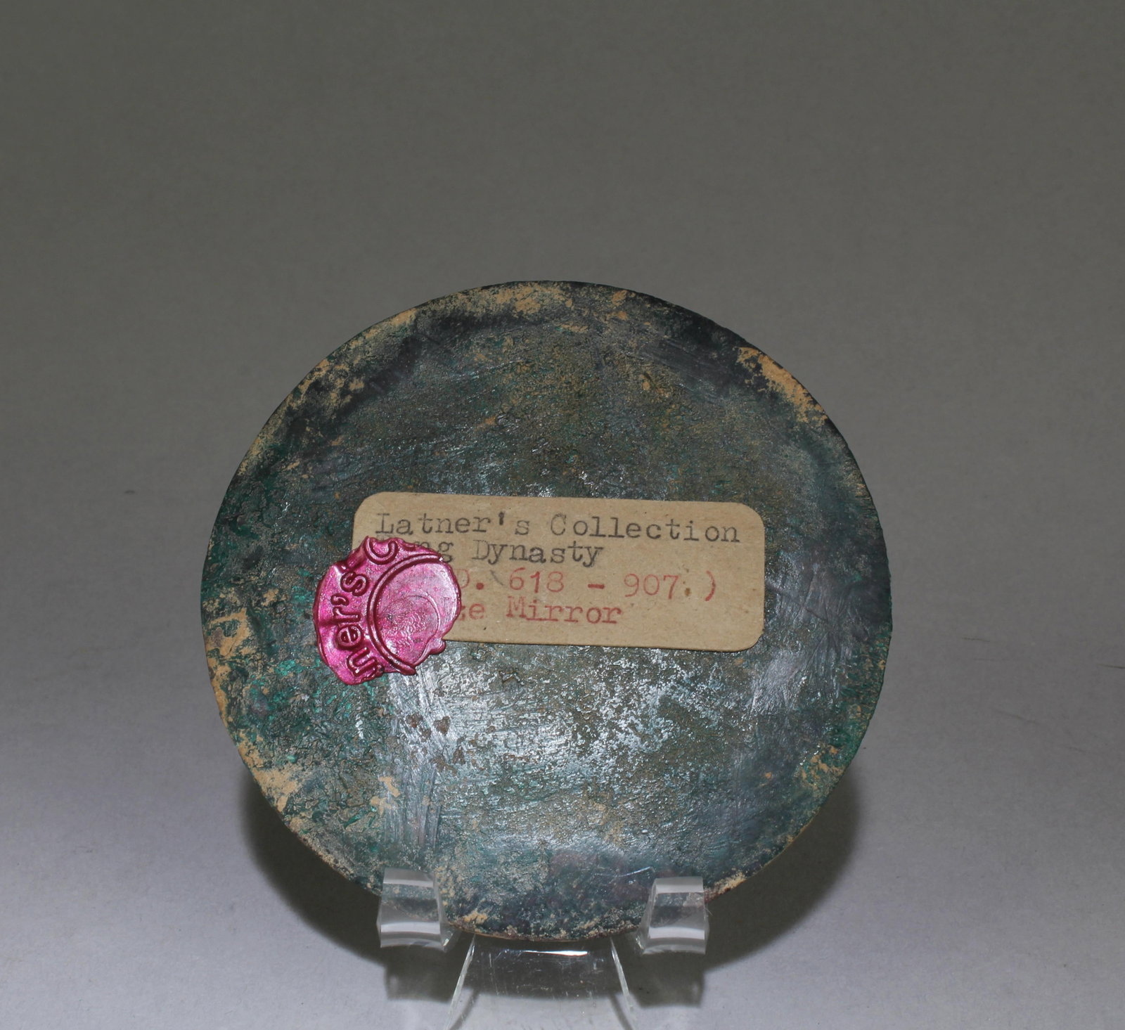 A Chinese Bronze Mirror: A Chinese Bronze Mirror. Diameter: 3.55"