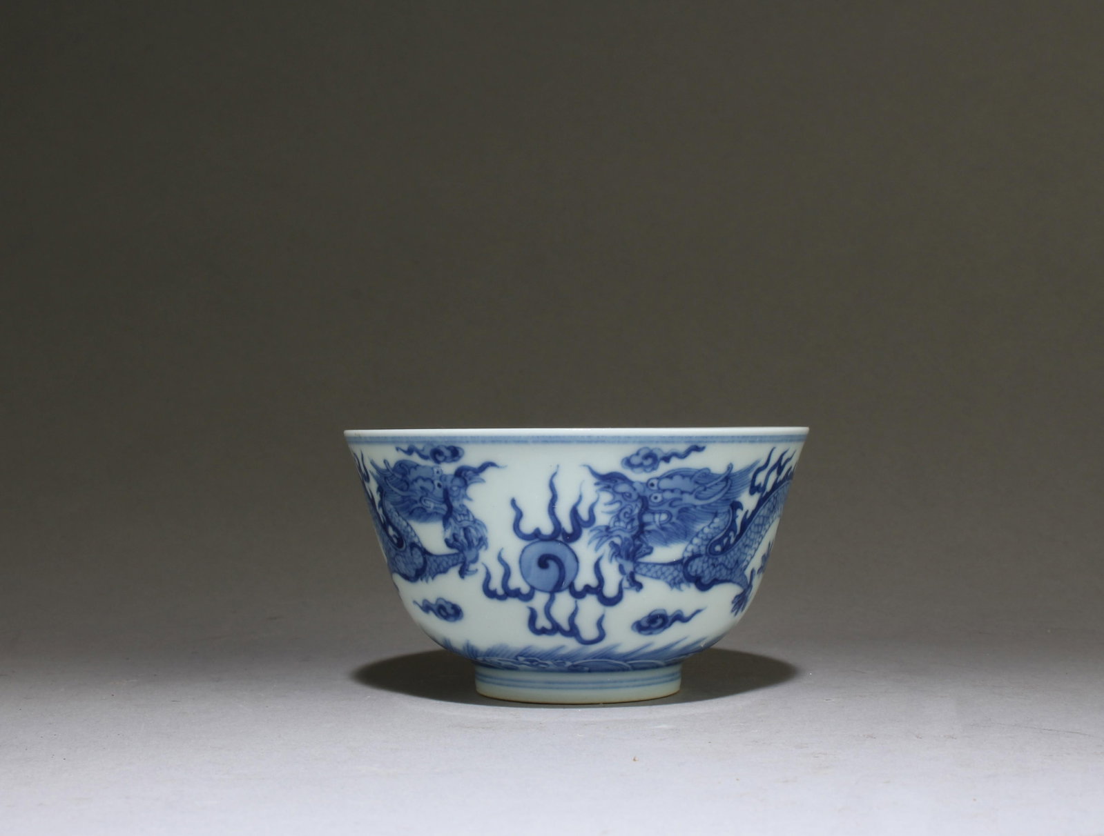 A Blue & White Porcelain Bowl: A Blue & White Porcelain Bowl. "QingLong" mark. Dimensions: 3.5" X 2"