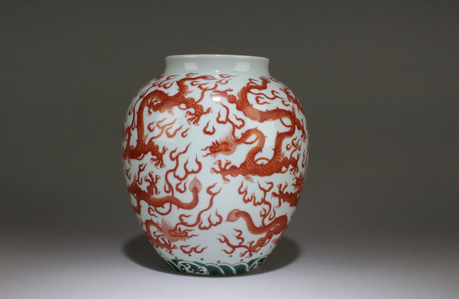 A Red Dragon Porcelain Jar: A Red Dragon Porcelain Jar. Dimensions: 7" X 6.5"
