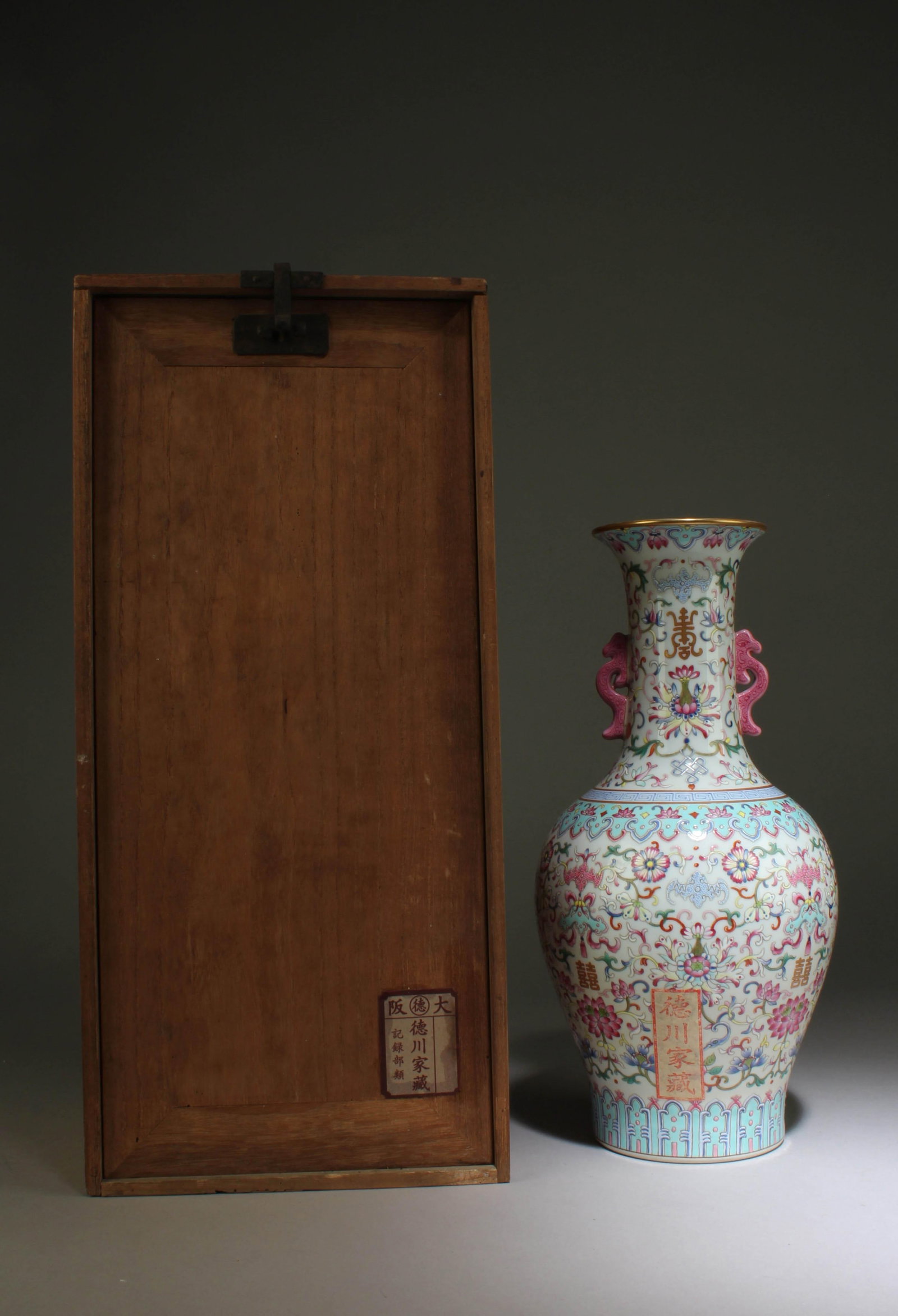 A Fencai Vase: A Fencai Vase. "QianLong" mark at base. Dimensions: 12" x 6.5". Formerly collected by the noble Tokugawa family in the Kansai region of Japan. These goods were first hidden in a temple called Bodaiji