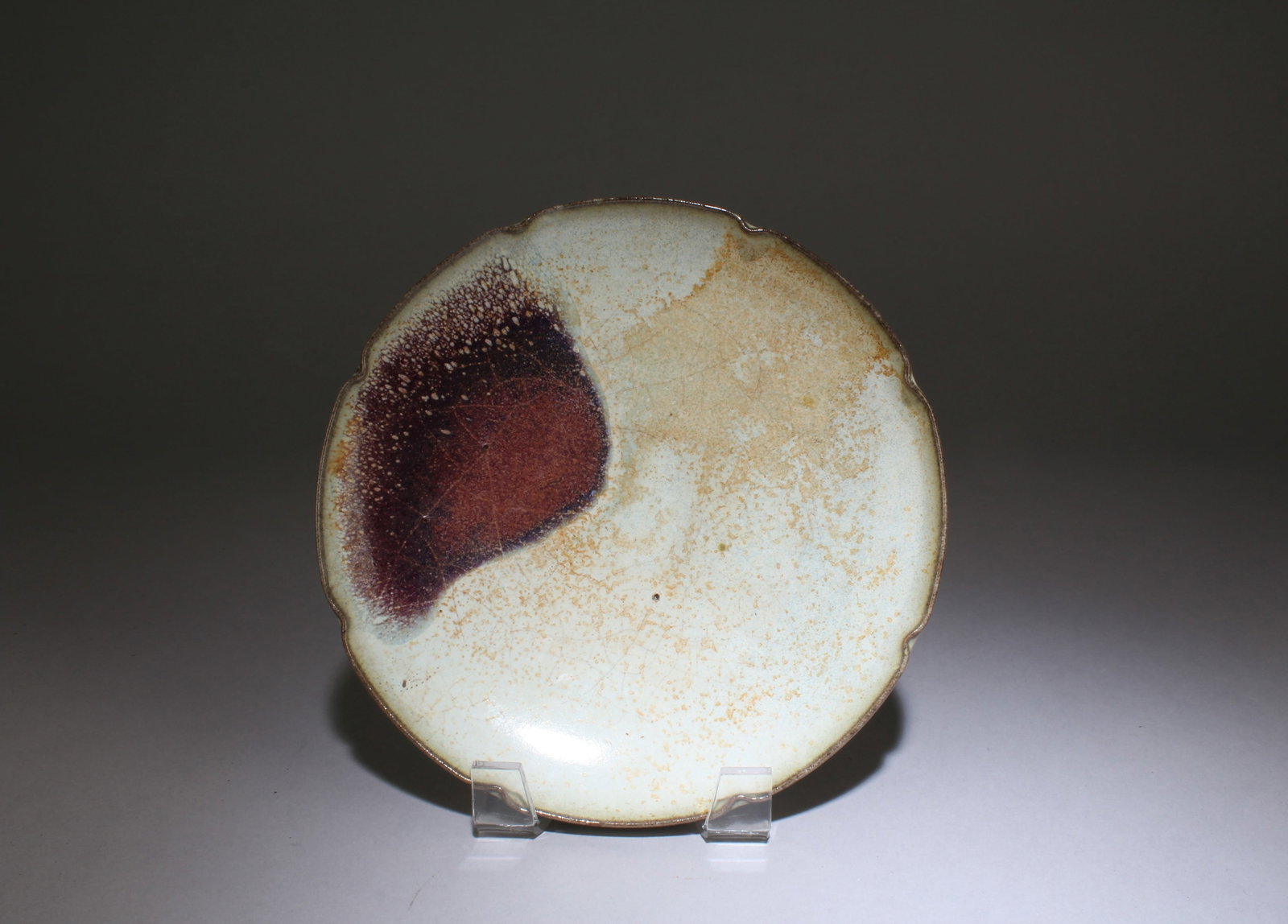 A Junware Plate: A Junware Plate. Diameter: 7.75".