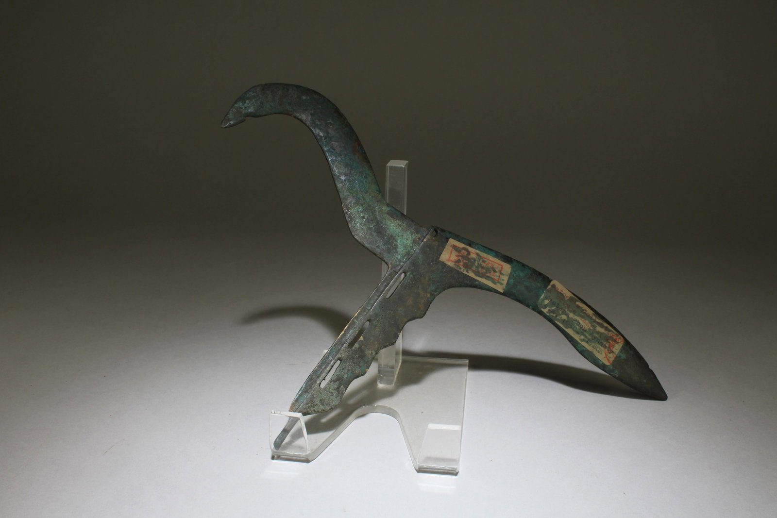 A Bronze Ornament: A Bronze Ornament. Dimensions: 10.5" x 7".