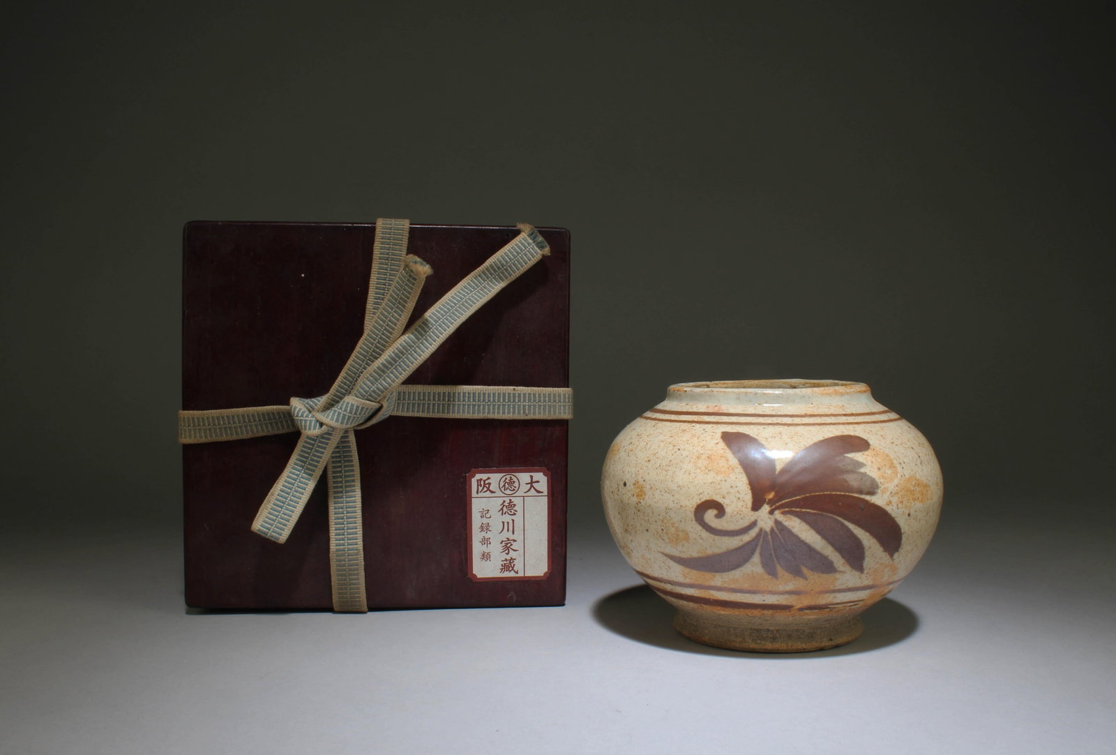 A Cizhou Jar: A Cizhou Jar. Dimensions: 5.5" x 4".