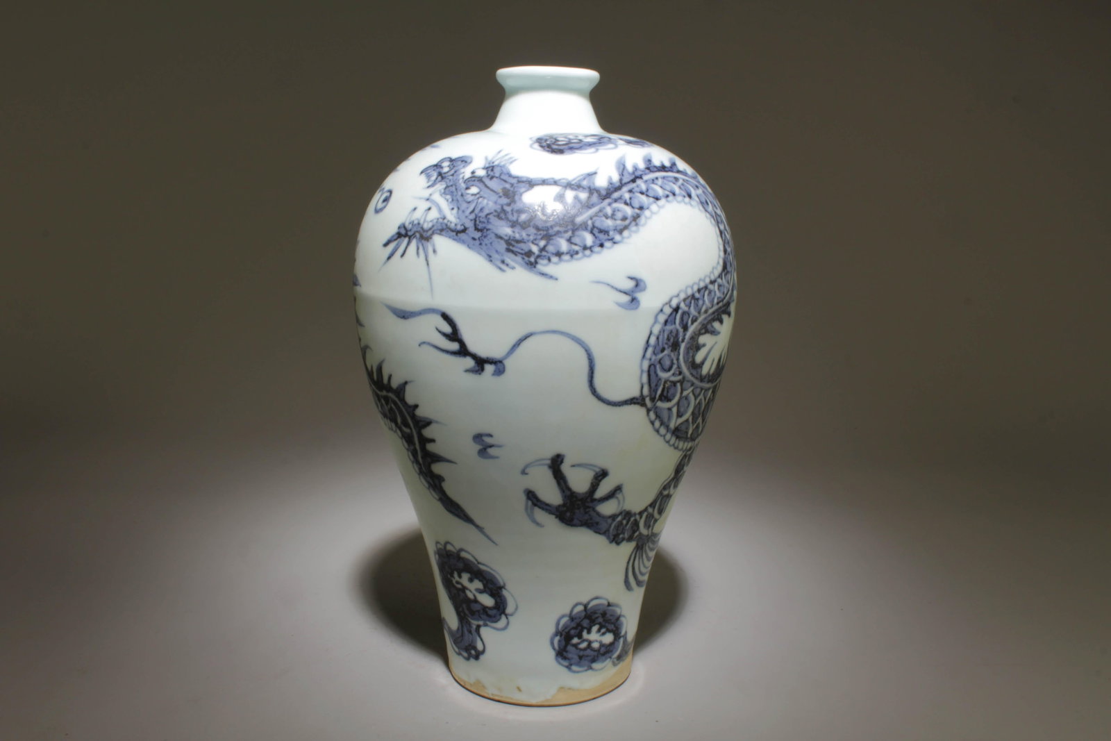 A Blue and White Vase: A Blue and White Vase. Dimension: 6" x 10.25".