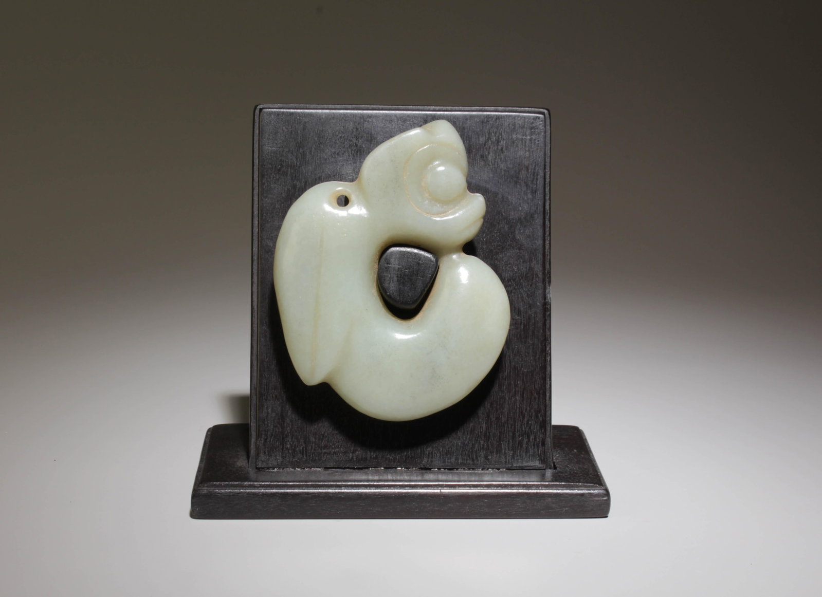 A Pig Dragon Ornament with Stand: A Pig Dragon Ornament with Stand. Dimension: 2.75" x 3.5".