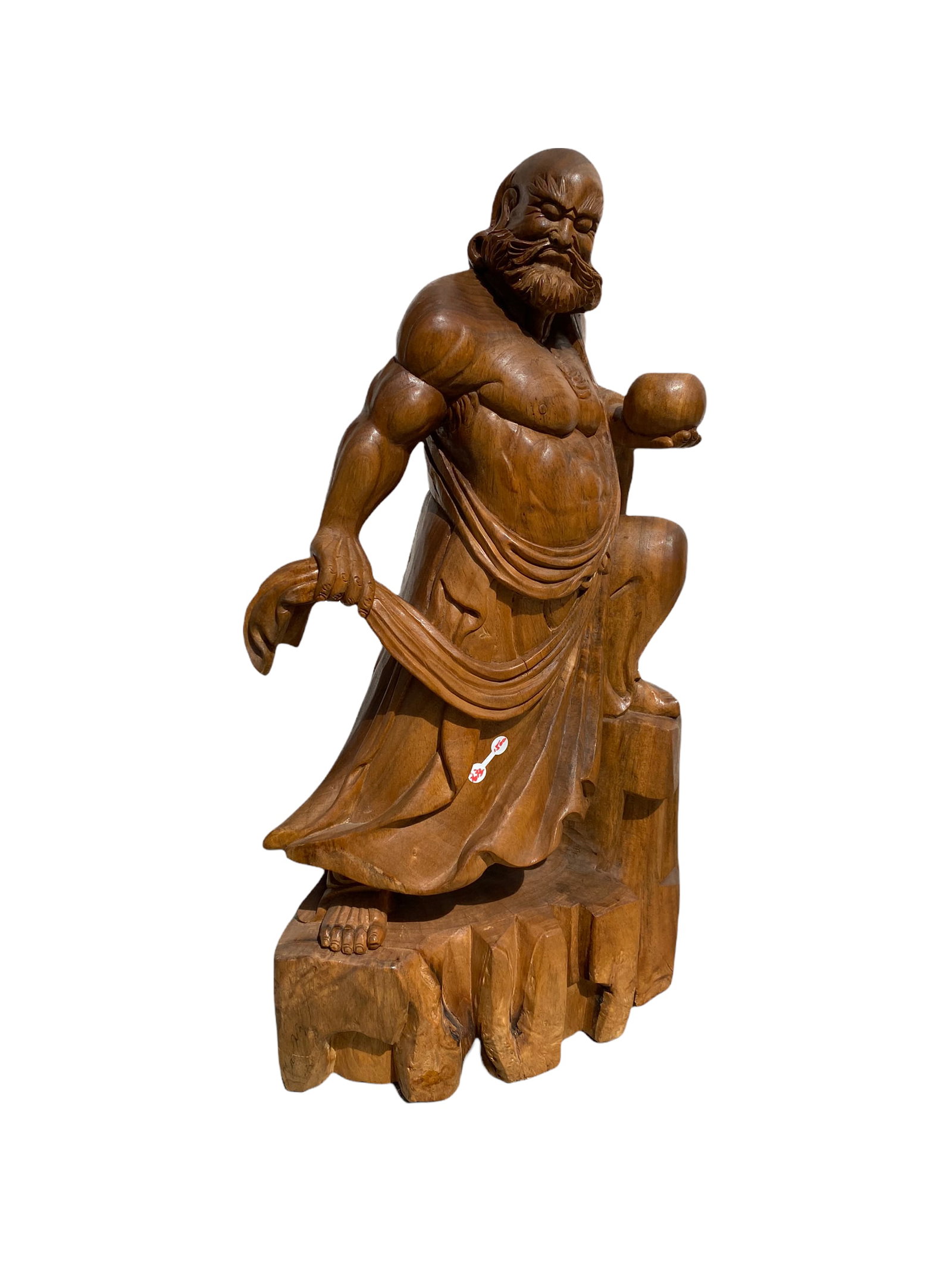 A Carved Wooden DaMo Statue: A Carved Wooden DaMo Statue. Height: 23.5" Length: 14.5"