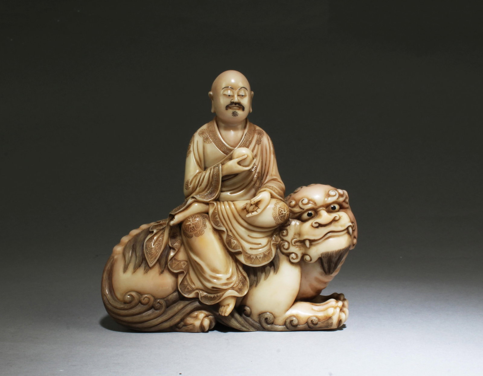 A Carved Soapstone Statue: A Carved Soapstone Statue. Height: 5.75" Length: 6" Provenance: From Pasadena Antique Center, California.
