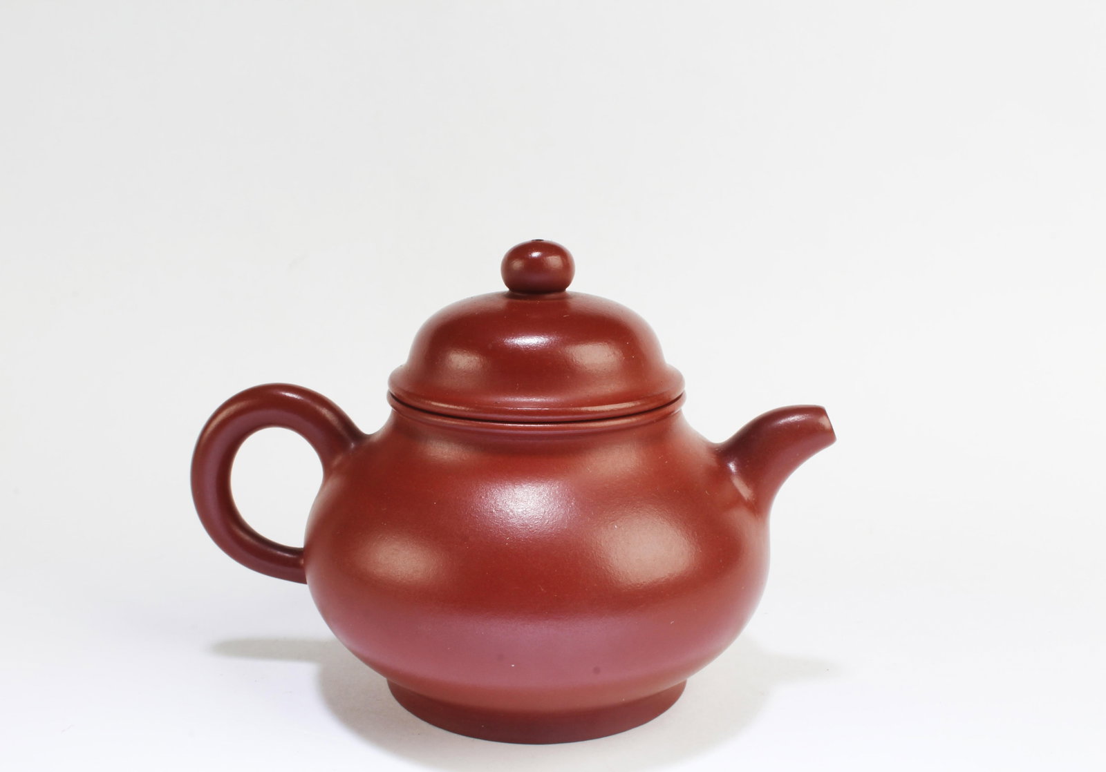 A Zhu Ni Yixing Teapot: A Zhu Ni Yixing Teapot. Length: 5.25"