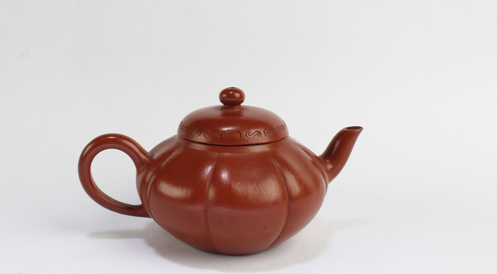 A Zhu Ni Yixing Teapot: A Zhu Ni Yixing Teapot. Length: 5"