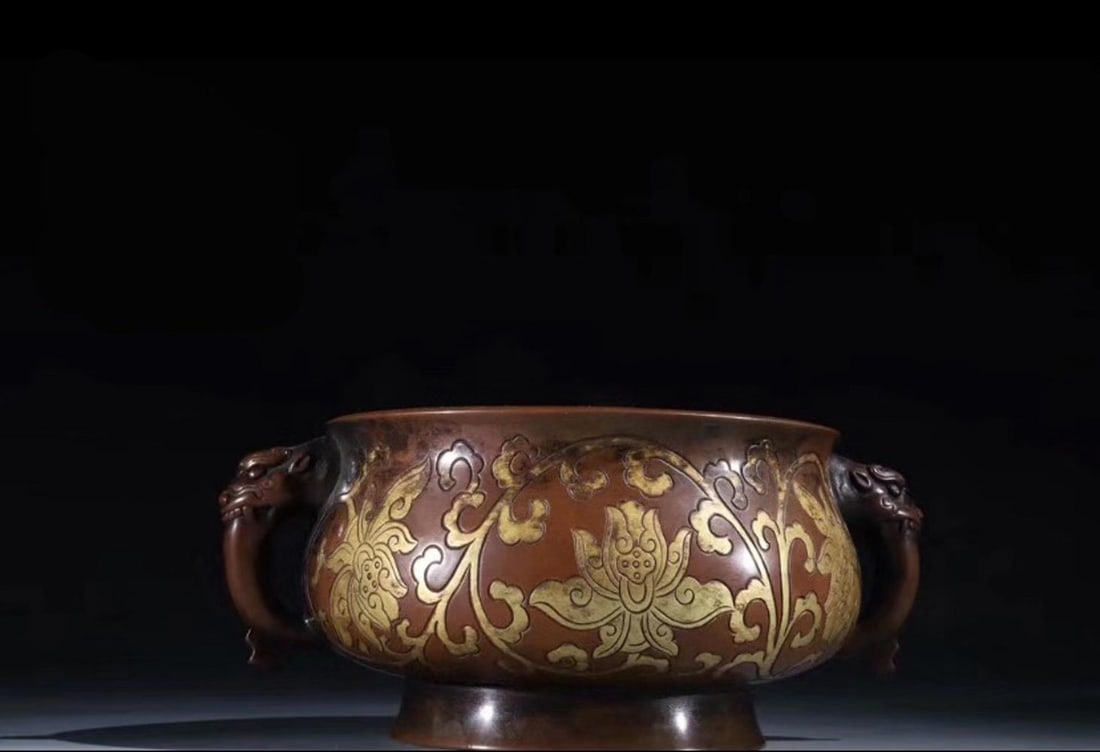 A Gilt Bronze Incense Burner: A Round Shaped Gilt Bronze Incense Burner. A three character mark is engraved at the base. Diameter: 4.5" Length: 7.08" Height: 3.14" Weight: 4.18lb