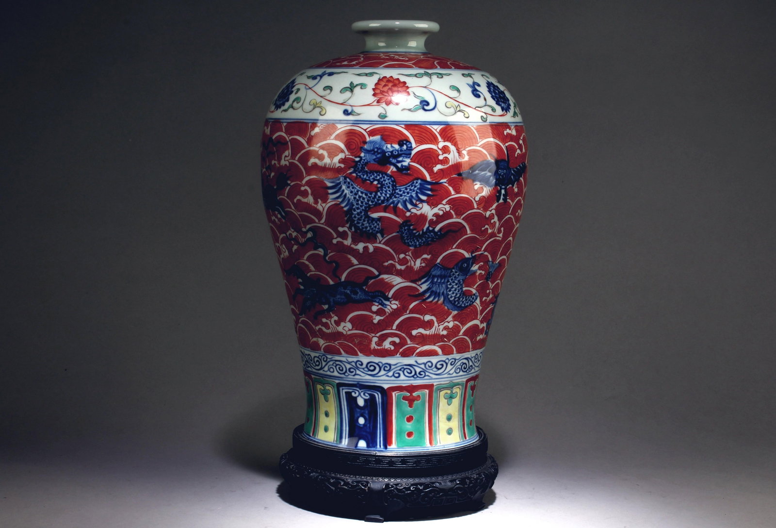 A Blue, White, and Red Vase: A Blue, White, and Red Vase. With stand. Dimensions: 15" x 8".
