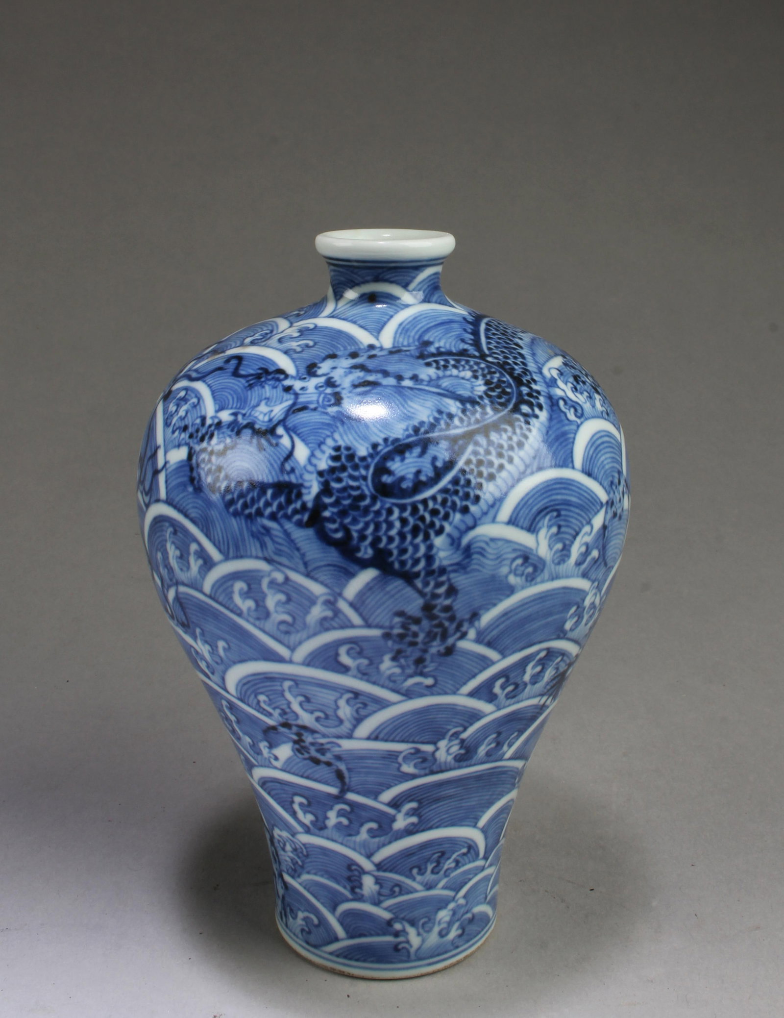 Chinese Blue & White Porcelain Vase: Chinese Blue & White Porcelain Vase. 'QianLong' mark at base. Height: 5.25"