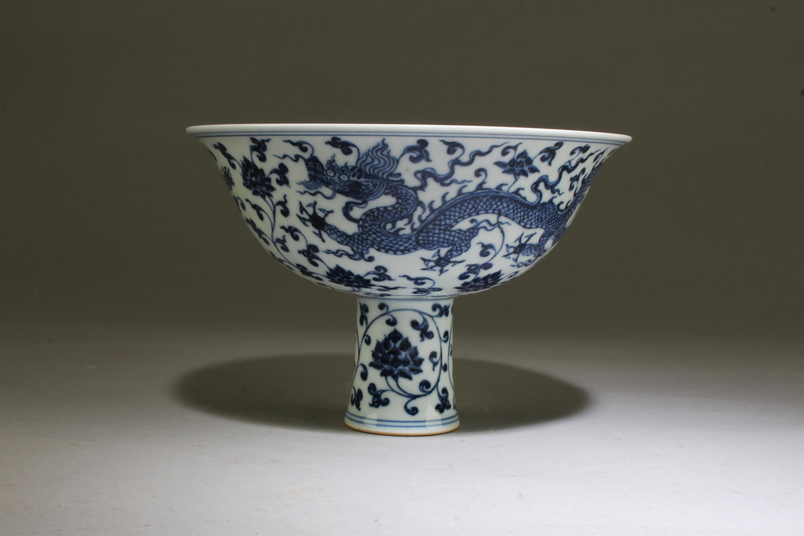 A Blue & White Stem Bowl: A Blue & White Stem Bowl. 'XuanDe' mark at base.Height: 4.6" Diameter: 7"