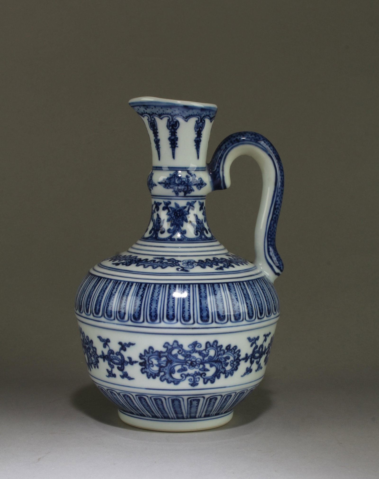 Chinese Blue & White Ewer: Chinese Blue & White Ewer. 'QianLong' mark. Height: 8"