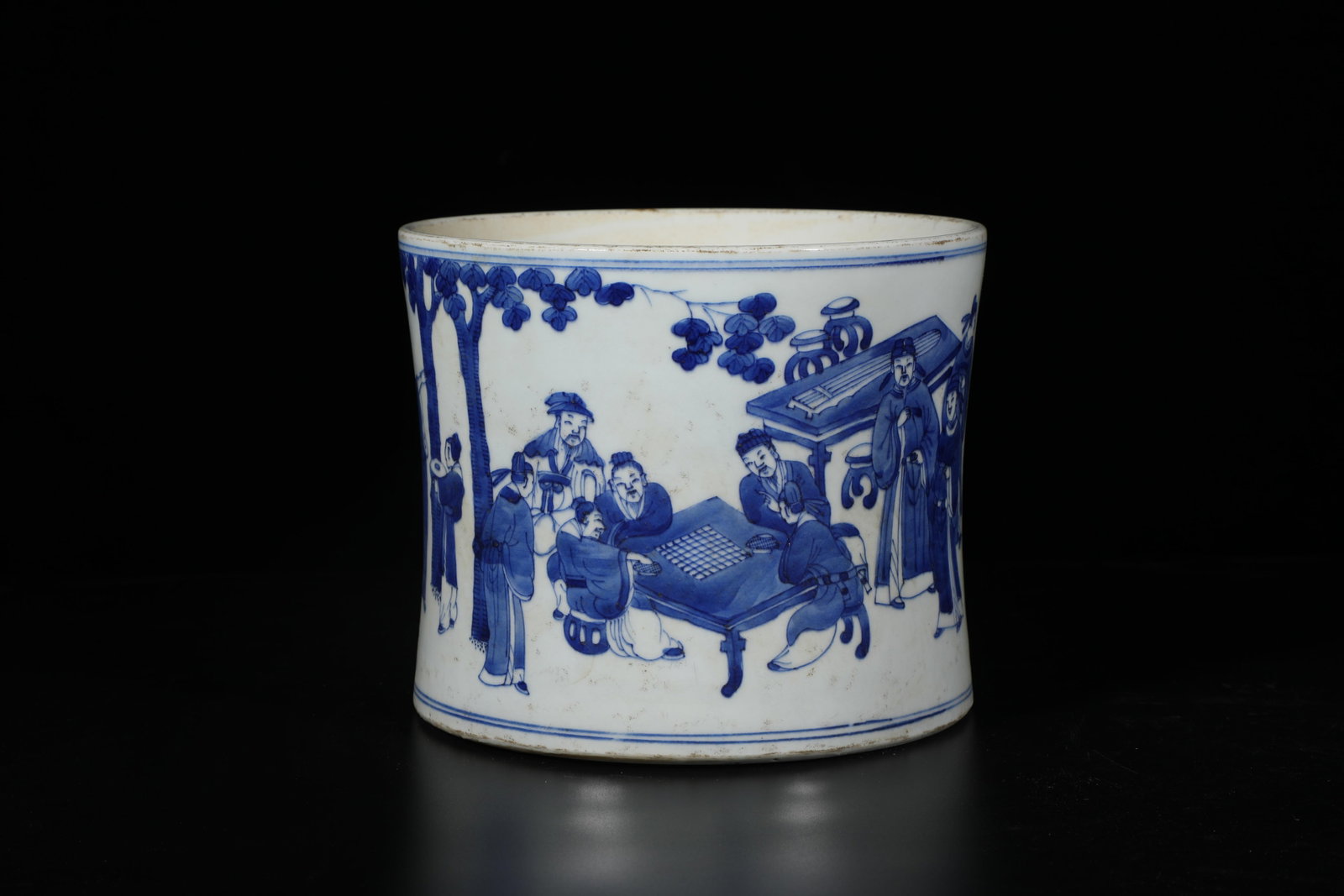 A Porcelain Brushpot: A Porcelain Brushpot. 'KangXi' mark at base. Height: 6.25" Diameter: 7.5"