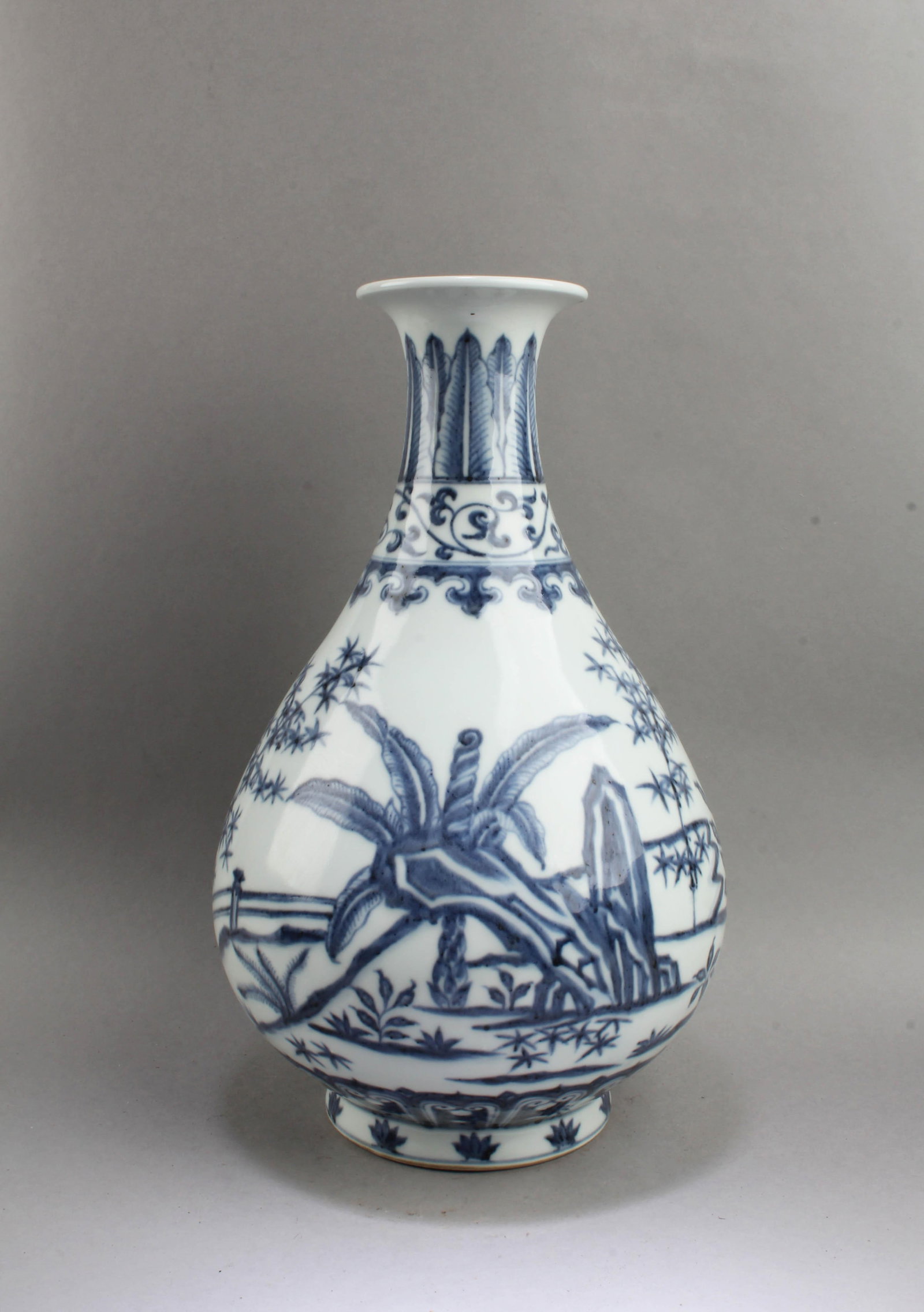Chinese Blue & White Porcelain Vase: Chinese Blue & White Porcelain Vase. A Four Character mark is imprinted at the base. Height: 13"