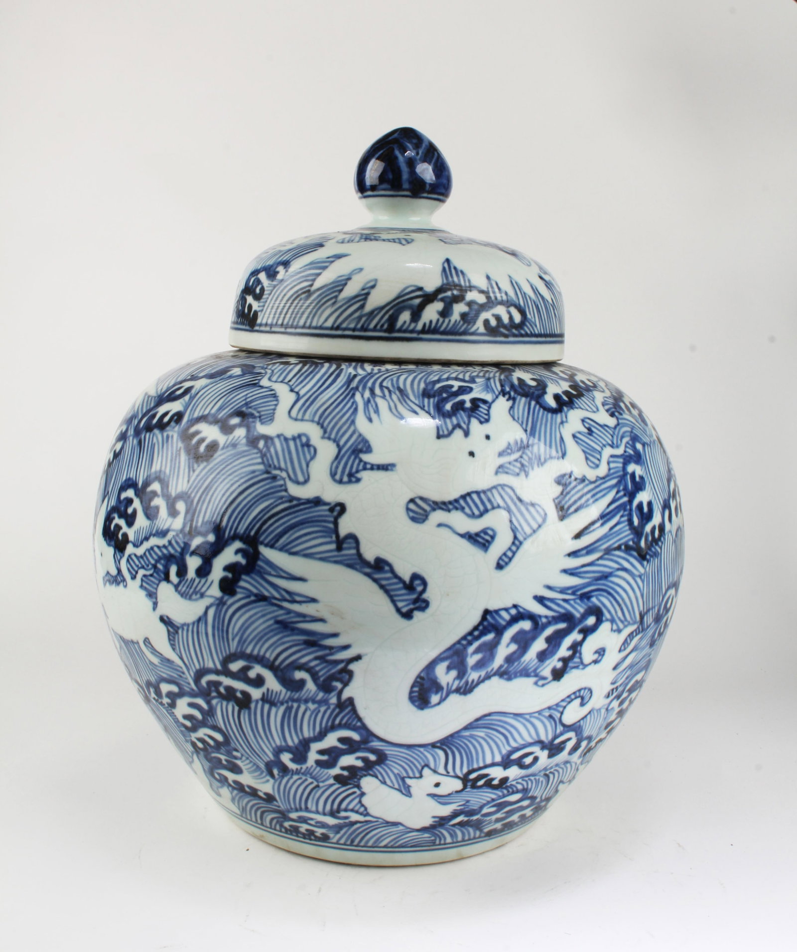 Chinese Blue & White Porcelain Jar: Chinese Blue & White Porcelain Jar with lid. 'XuanDe' mark. Height: 16"
