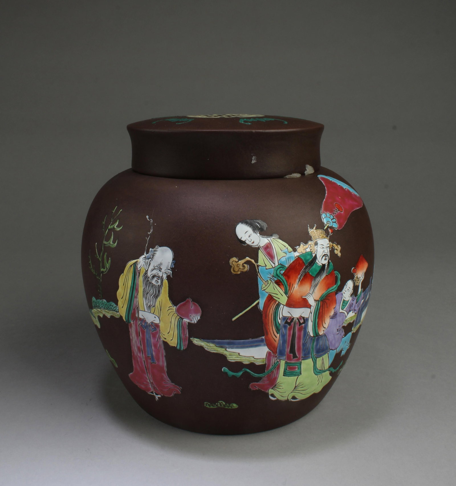 An Unique Zisha Jar: An Unique Zisha Jar, depicting enamel decorations. A four character mark is imprinted at the base. Height: 8"