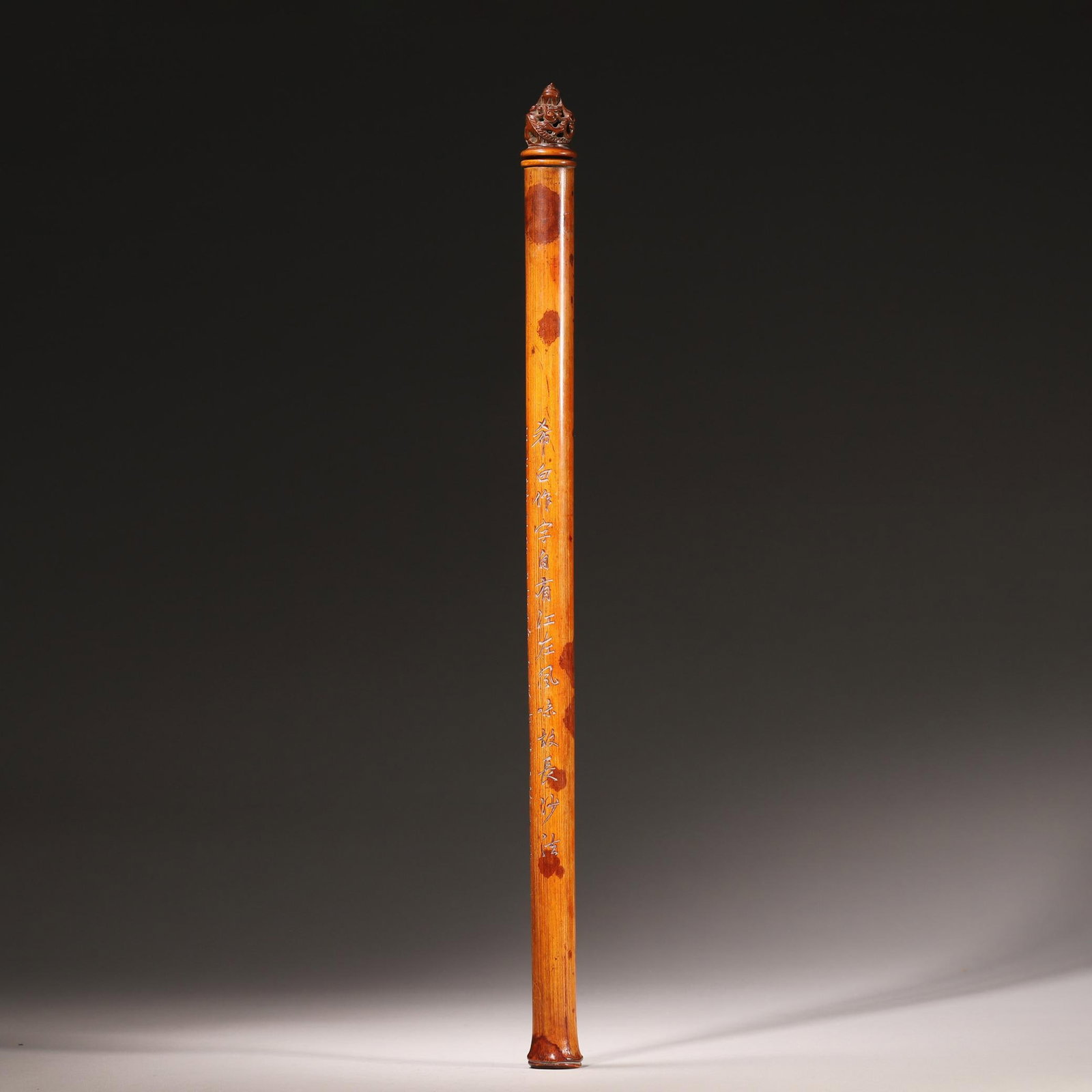 A SPOTTED BAMBOO INCENSE TUBE WITH OPENWORK CHI-DRAGON FINIAL, SIGNED LIN SHAOMU, QING DYNASTY: D 2.00cm (0.79 in); L 38.00cm (14.96 in); Wt 44.00g (0.097 lb),Incense tube crafted from spotted Xiangfei bamboo with natural russet markings and warm aged patina. Finial of boxwood openwork carved wi