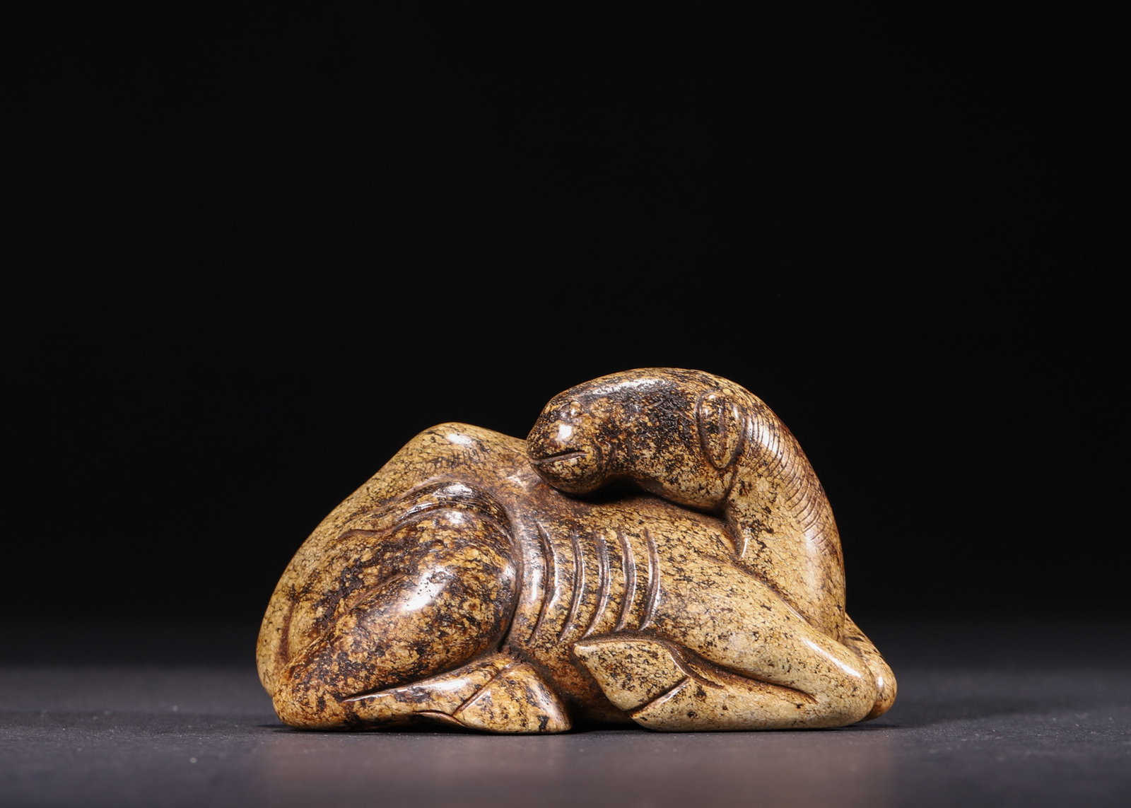 A Hetian Jade Recumbent Camel Ornament, Medieval China (1 of 7)