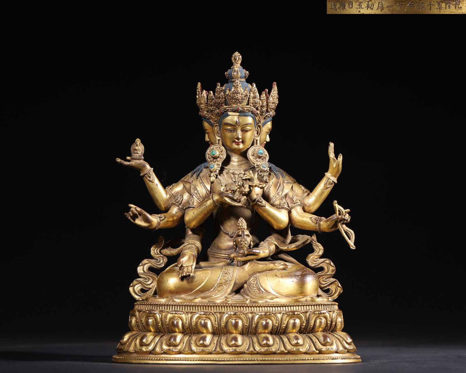 IMPERIAL COMMISSIONED GILT-BRONZE FIGURE OF EIGHT-ARMED THREE-FACED BUDDHA MOTHER, QING DYNASTY,: 7.09" x 4.33" x 9.06" inches (18.0 cm x 11.0 cm x 23.0 cm) (Main) | Weight: 4.57 lbs (2072.0 g)A fine imperial gilt-bronze figure of Eight-Armed Three-Faced Buddha Mother, Qianlong period, Qing Dynast