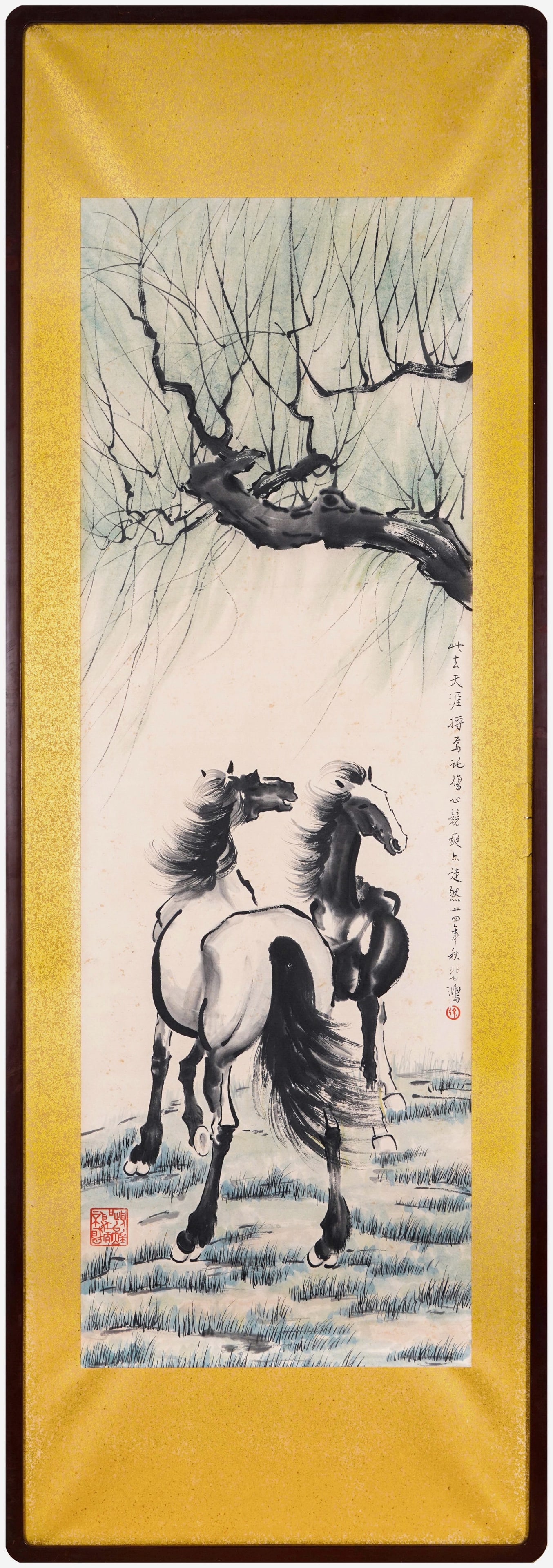 Xu Beihong (1895-1953) Two Steeds Under the Willow, framed ink and color on paper, dated 1945: 44.1in x 14.6in (112.0cm x 37.0cm)A powerful equine painting by Xu Beihong, painted in 1945. Two dynamic horses with flowing manes stand under willow branches, rendered in his iconic bold brushwork. I