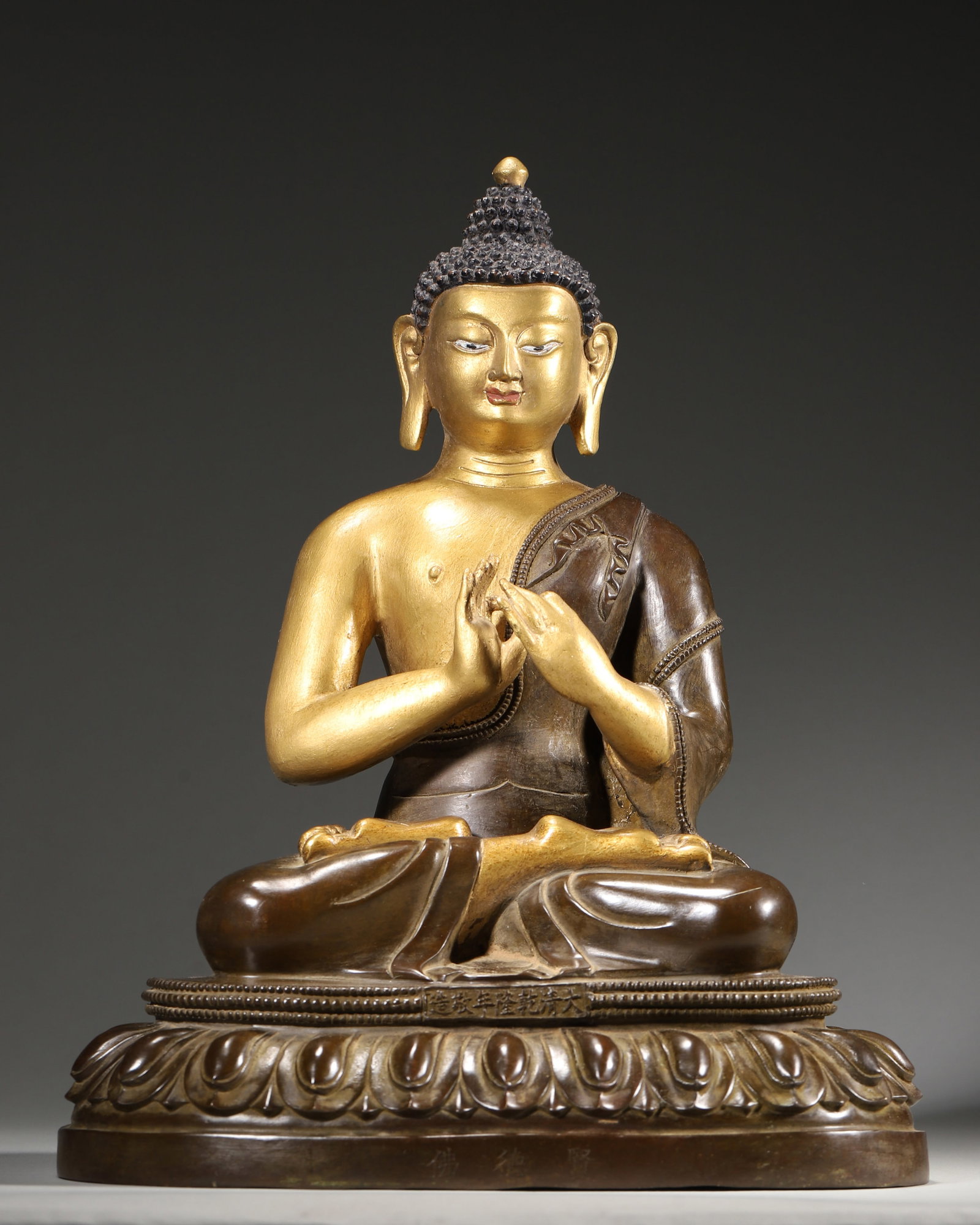 A Gilt-bronze seated statue of Sakyamuni,Qing Dynasty, (1 of 11)