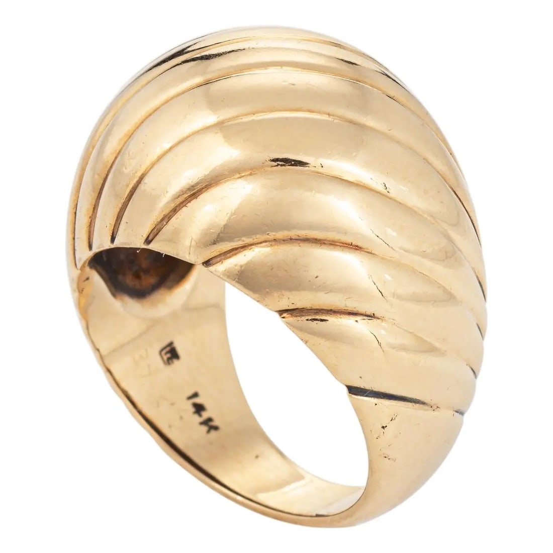 14K Gold Ribbed Dome Ring: 14K GOLD RIBBED DOME RING Description: The ring is designed as a substantial domed form that tapers smoothly toward the back of the band, creating a comfortable yet visually bold silhouette. The surfa