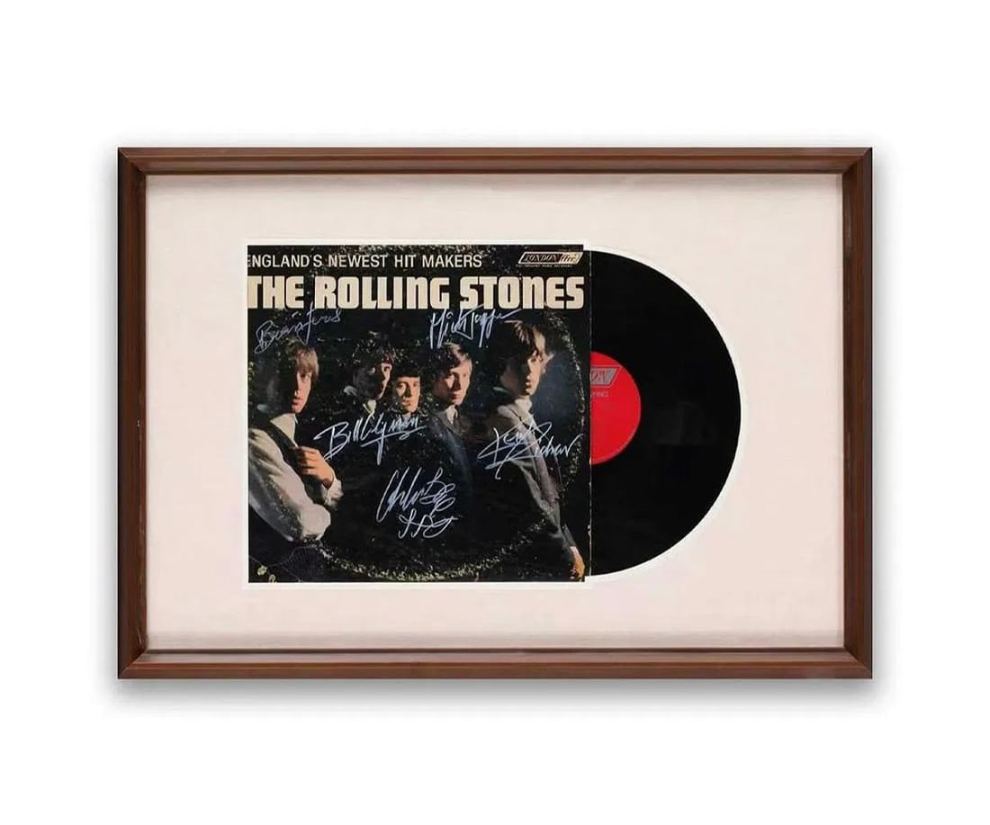 The Rolling Stones signed vinyl record of "England's Newest Hit Makers": THE ROLLING STONES SIGNED VINYL RECORD OF "ENGLAND'S NEWEST HIT MAKERS" Dimensions: Vinyl records Size 12 1/4 x 12 1/4 in Provenance and Authenticity: This collectible has undergone a rigorous forensi