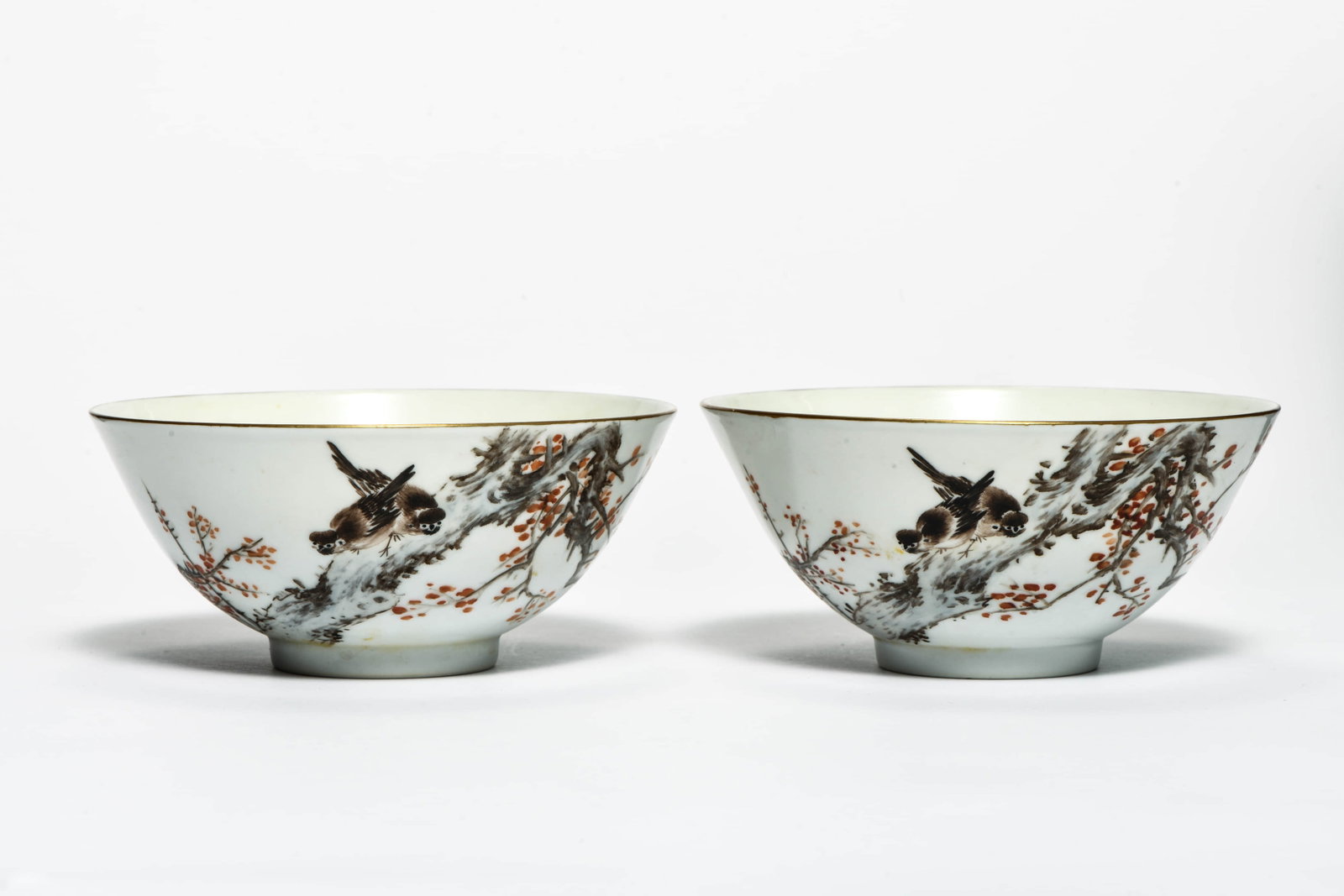 A pair of famille rose 'Magpies on plum' bowls: A PAIR OF FAMILLE ROSE 'MAGPIES ON PLUM' BOWLS Description: Diameter: 19cm Height: 8cm